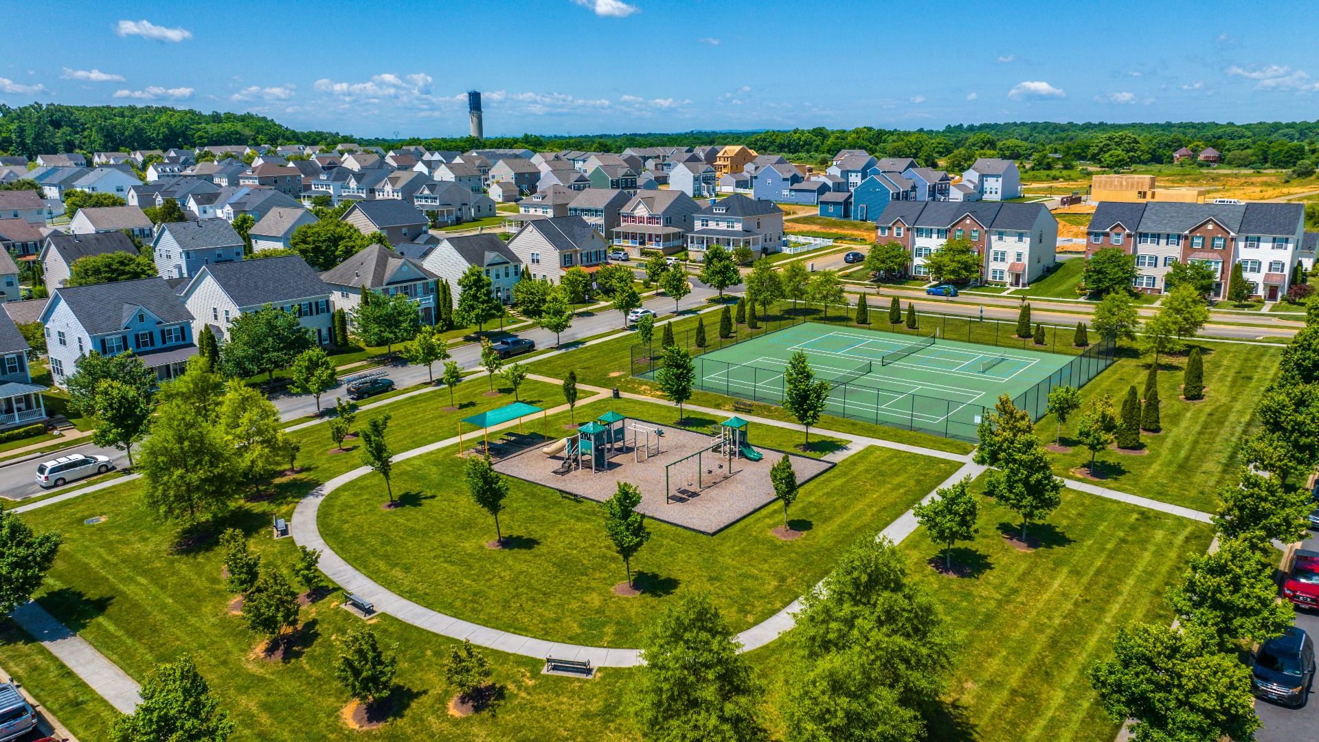 Stay active with community amenities including tennis courts and a playground.