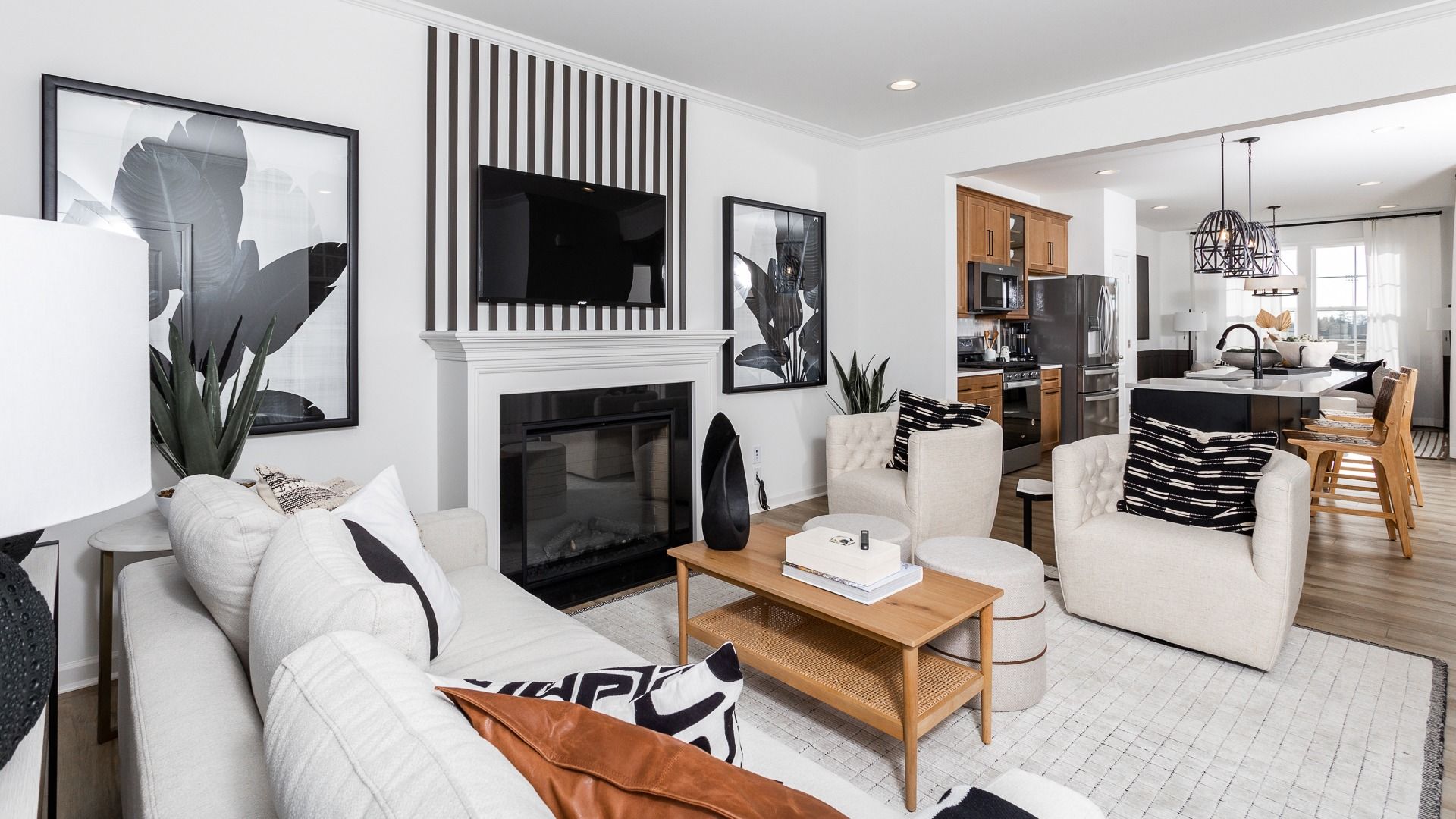 The living room in the Bedford II floor plan offers modern design and cozy seating.