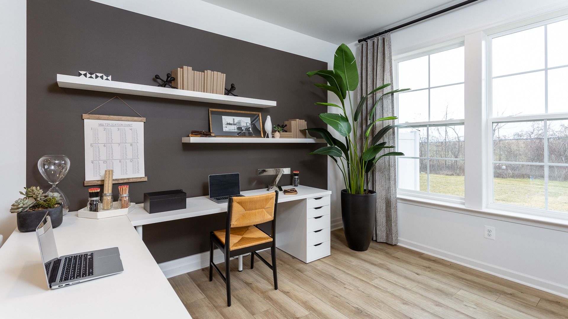 Get productive in the dedicated study space with a large L-shaped desk in the Bedford II floor plan.