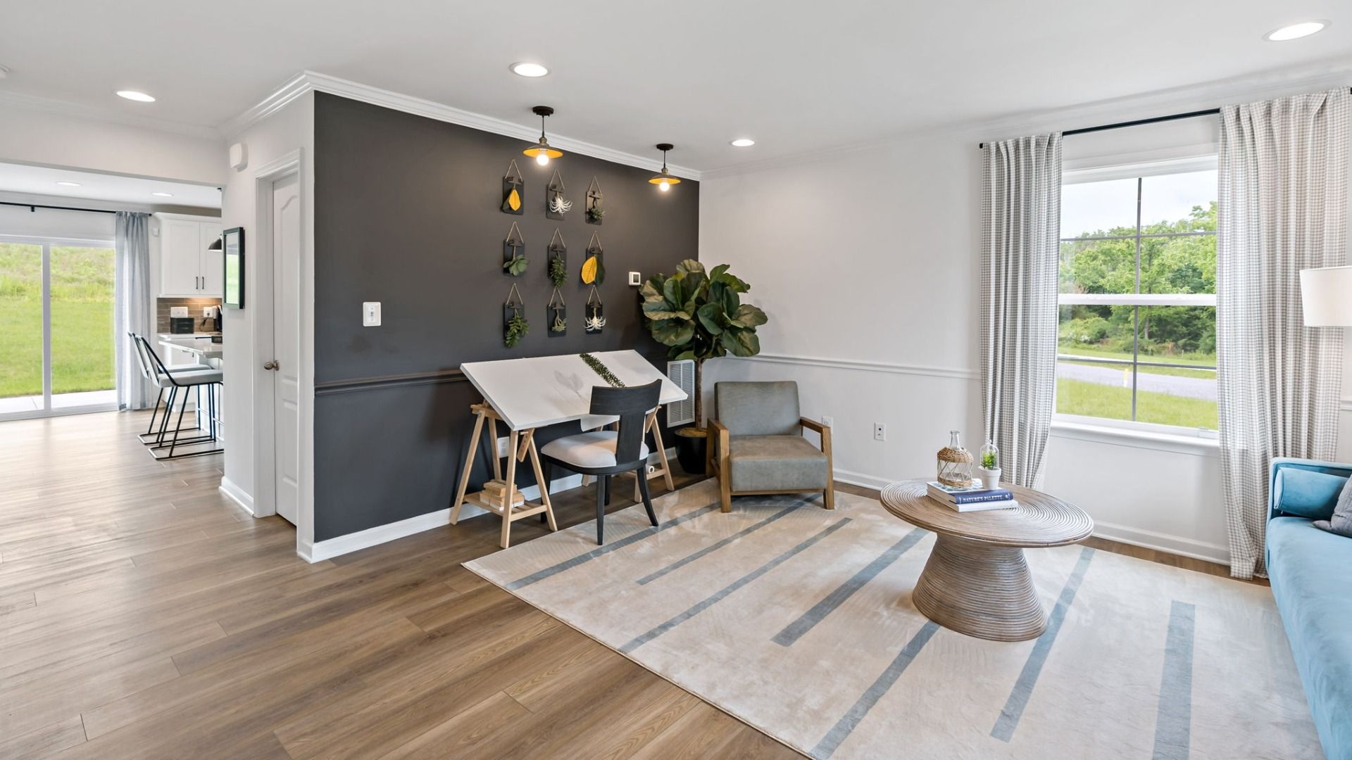 Turn the Carnegie II flex room into a creative art space with desk, storage, and seating.