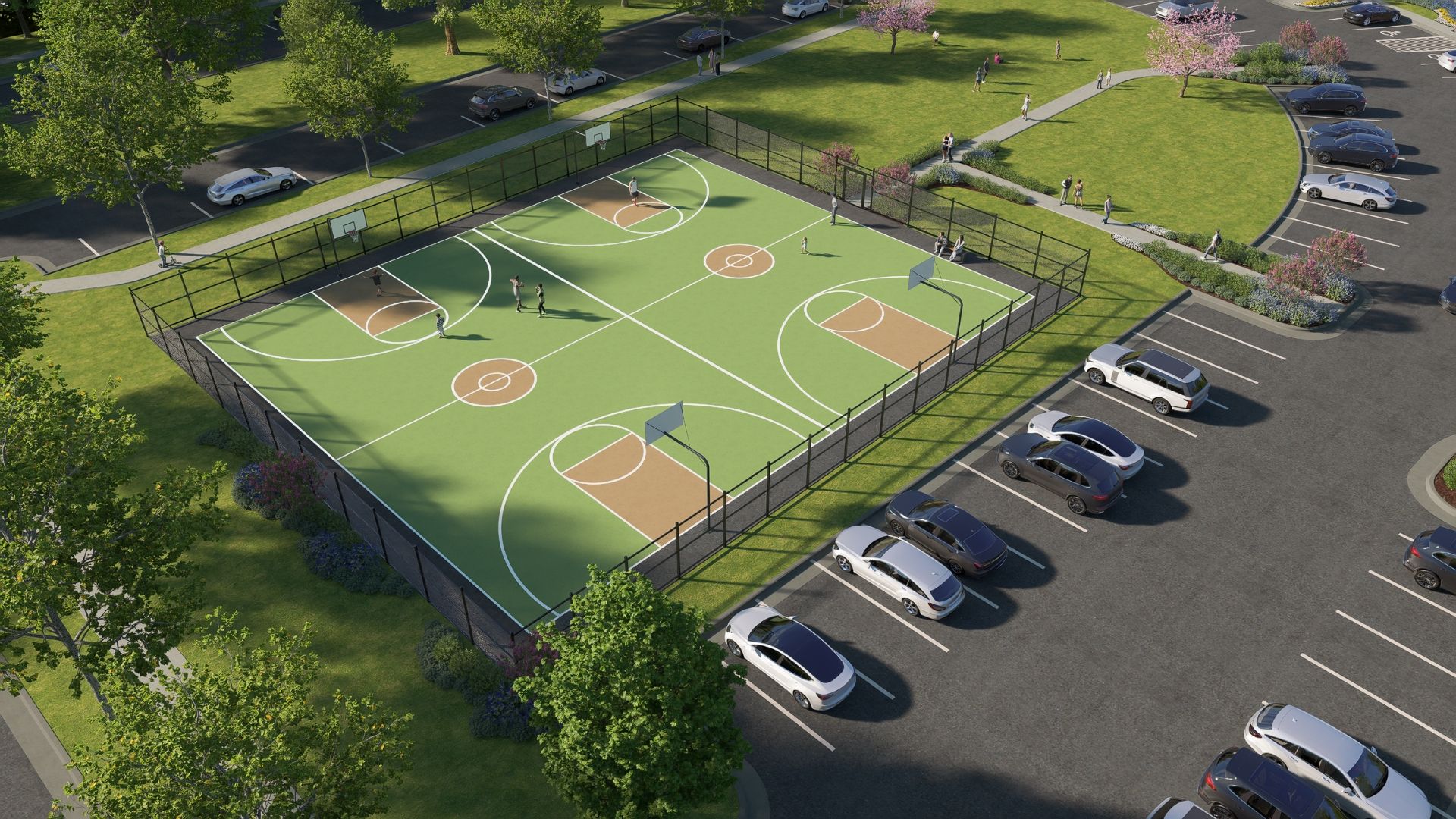 Bird’s-eye view of full-size basketball courts, coming summer 2026, perfect for games and fun.
