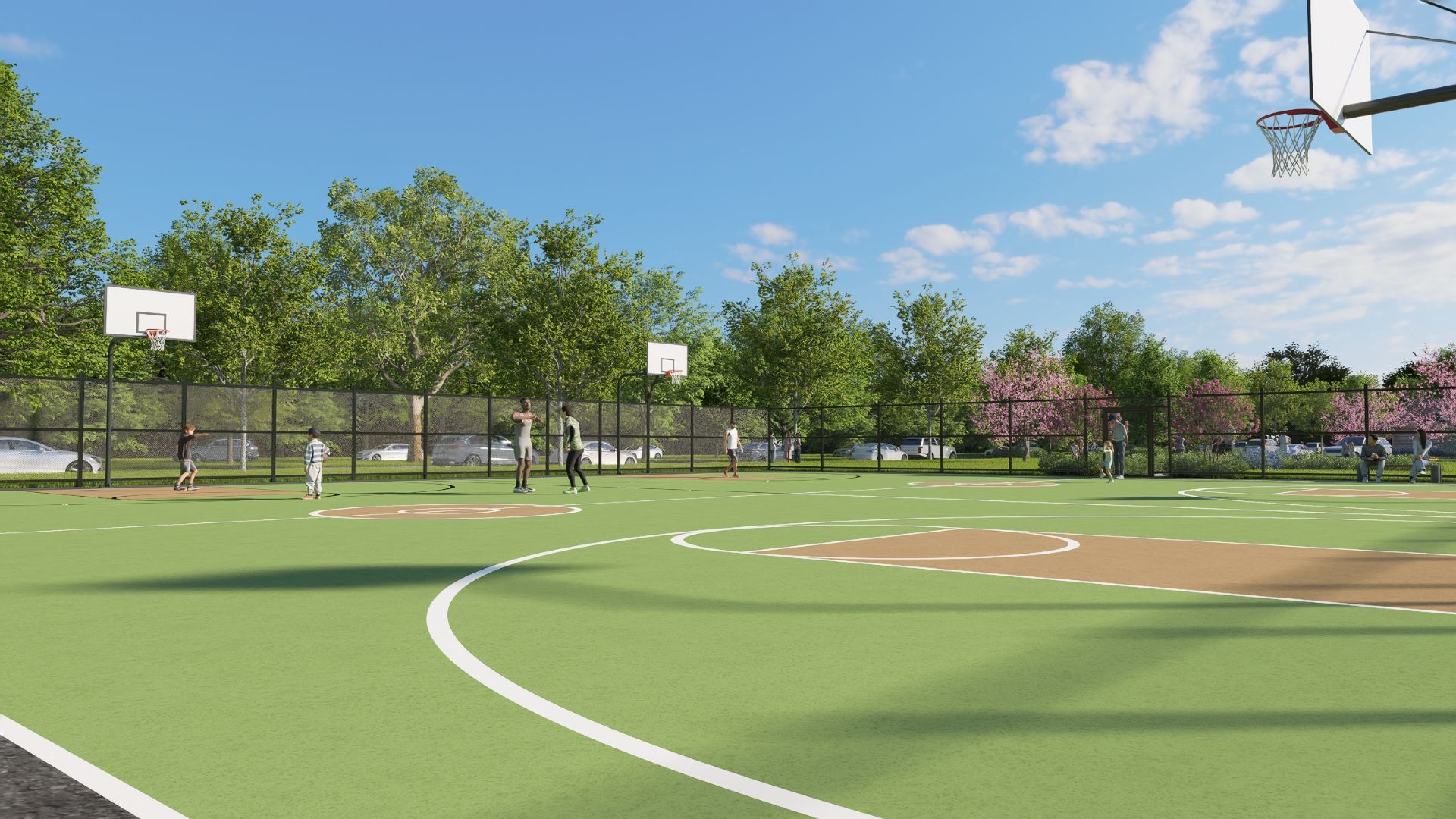 Huntfield basketball courts, opening summer 2026, offer space for games and active recreation.