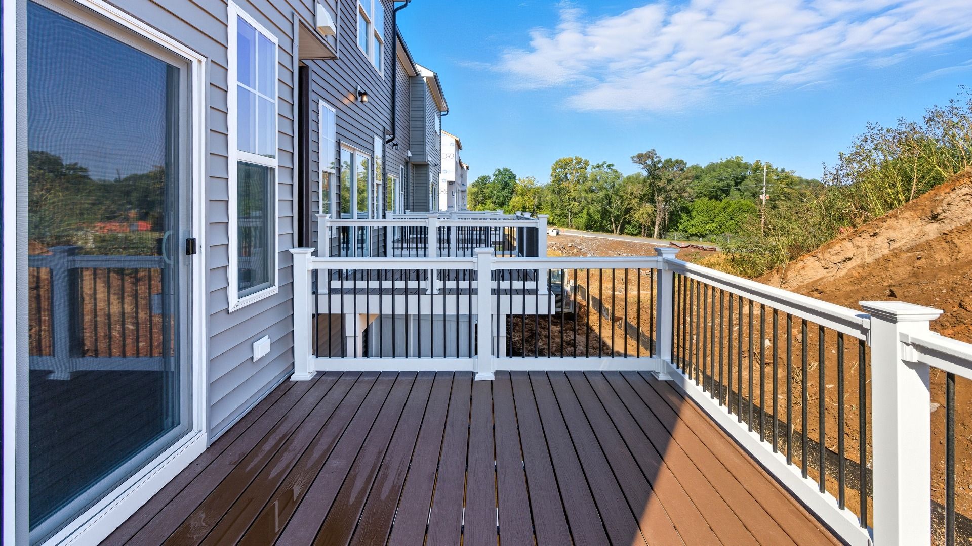 Enjoy outdoor living on the Bedford II’s included Trex deck, perfect for relaxing or entertaining.