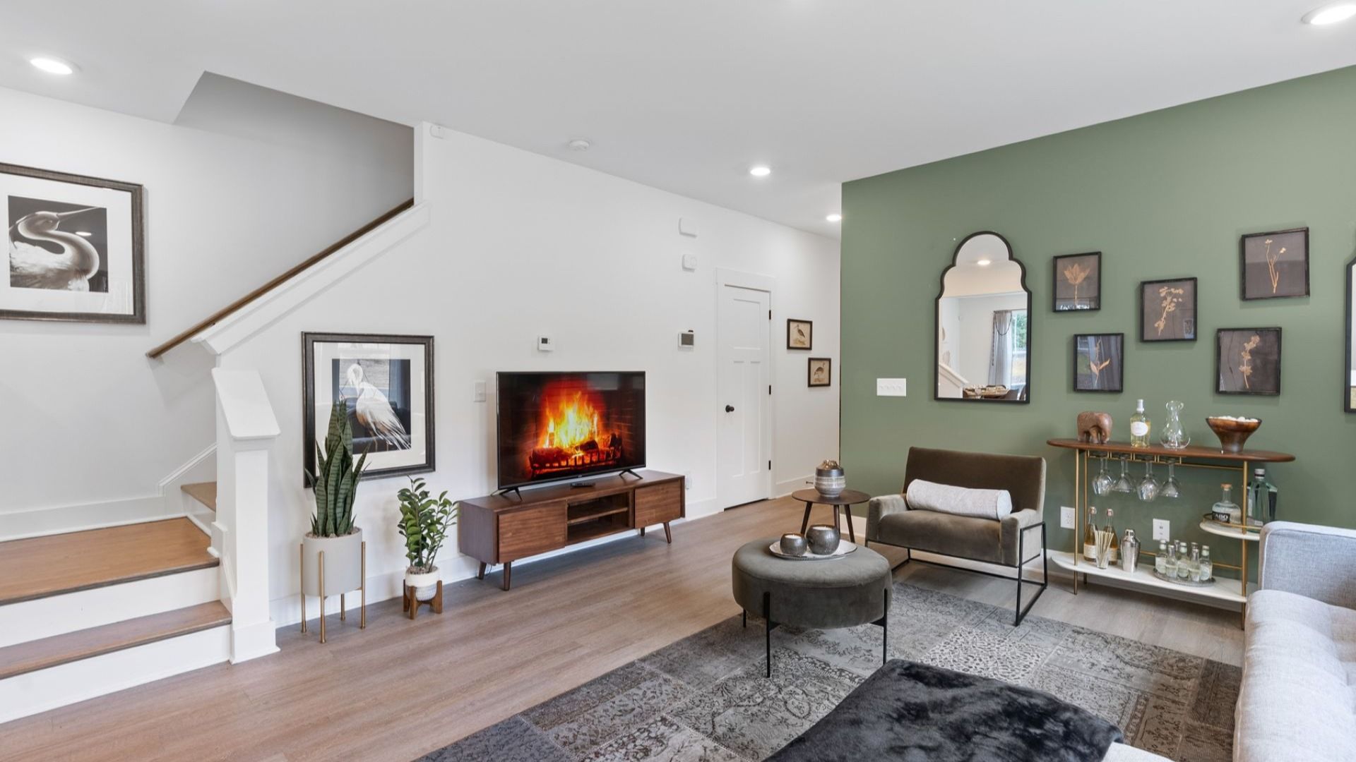 Spacious family room with accomplished design and eye-catching details throughout at the new Brookland Place community