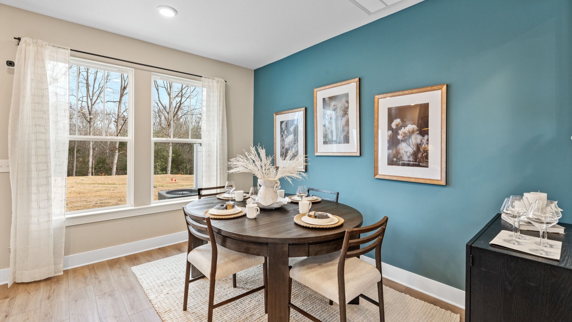 Inviting breakfast area with a seamless connection to the kitchen for everyday living near Downtown Hendersonville