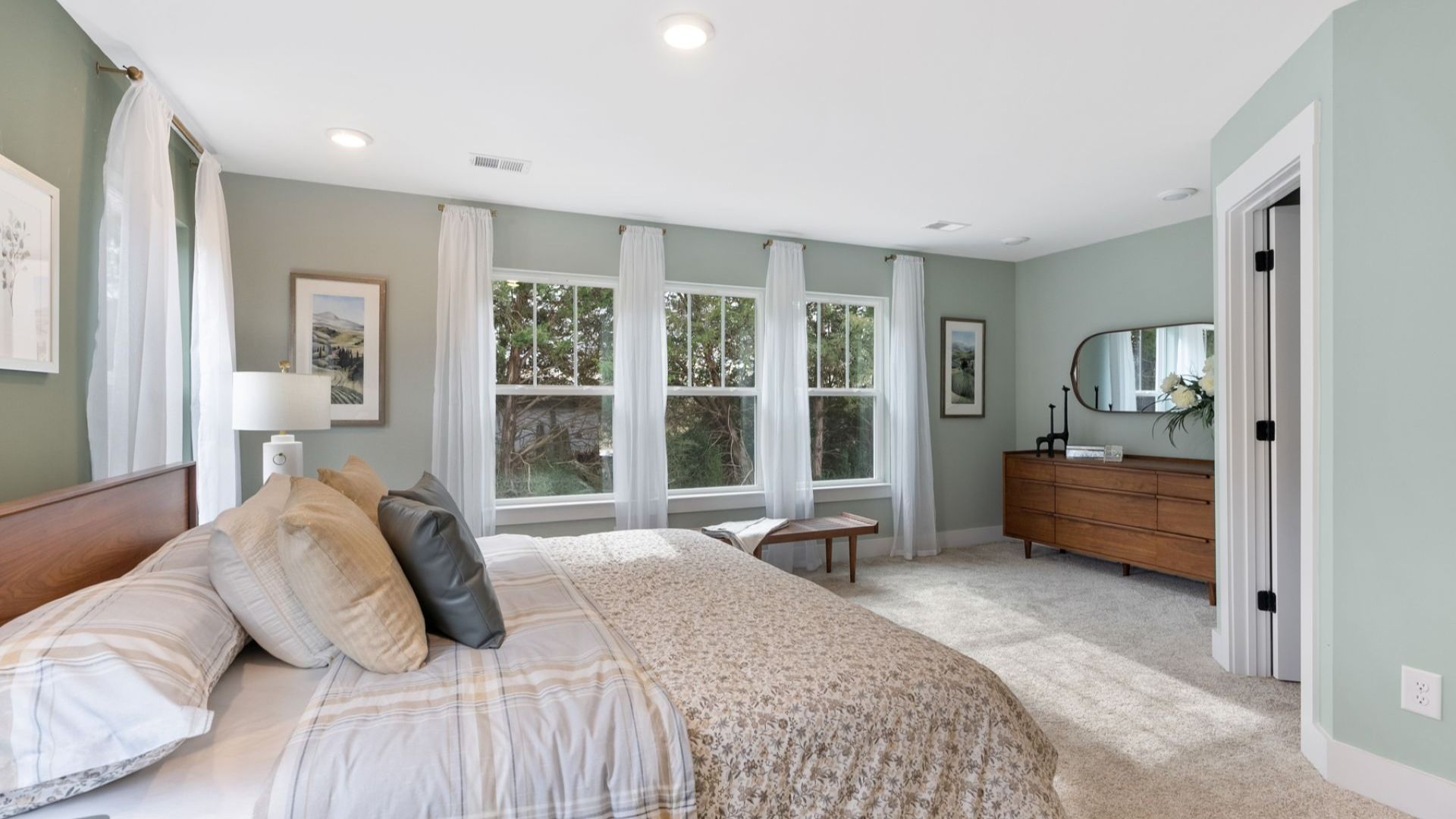 Distinguished primary bedroom featuring upscale finishes and timeless sophistication near the Blue Ridge Parkway