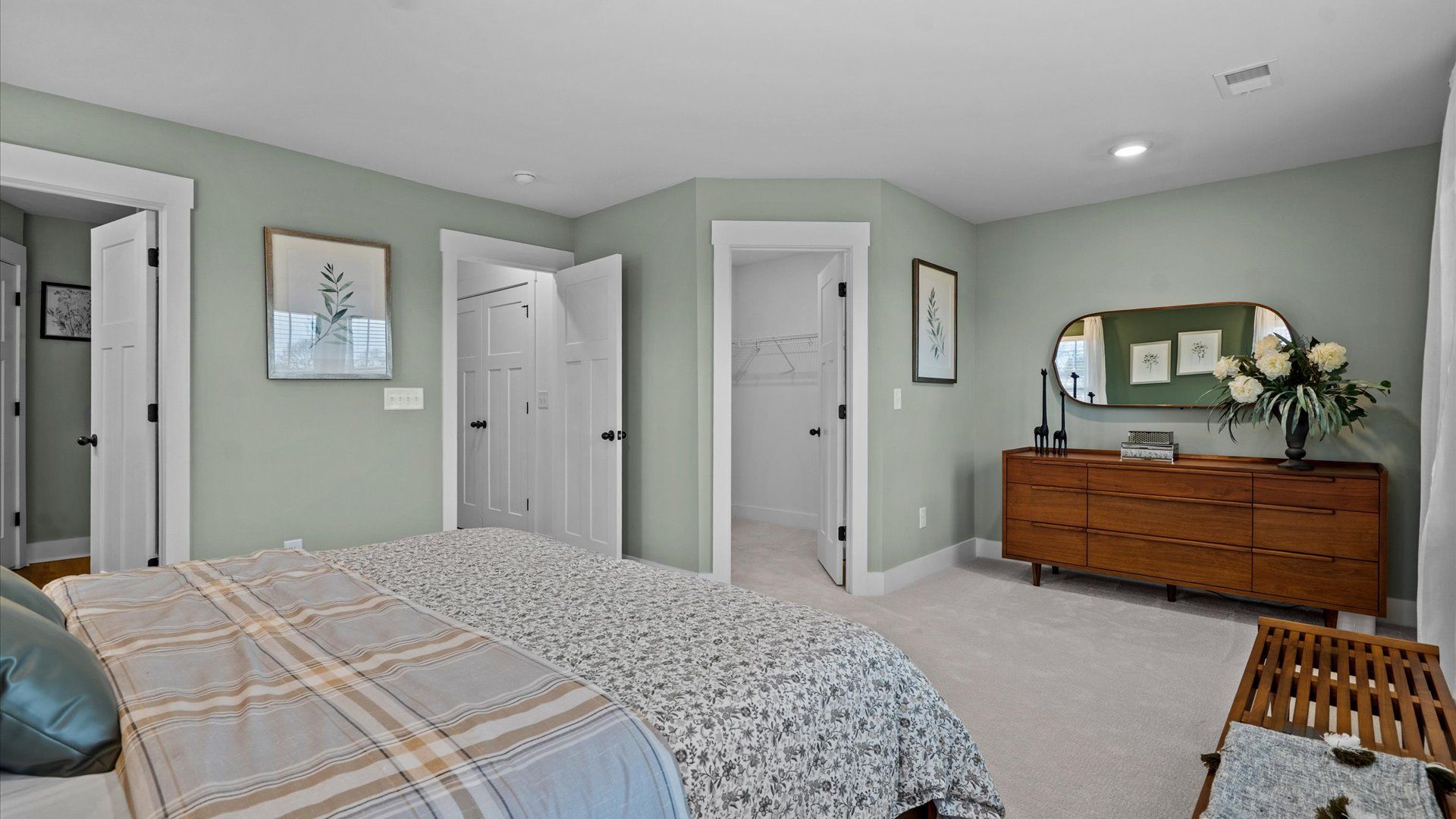 Exclusive upstairs retreat with a bright and airy primary suite with a walk-in closet in this townhome at Gresham Station