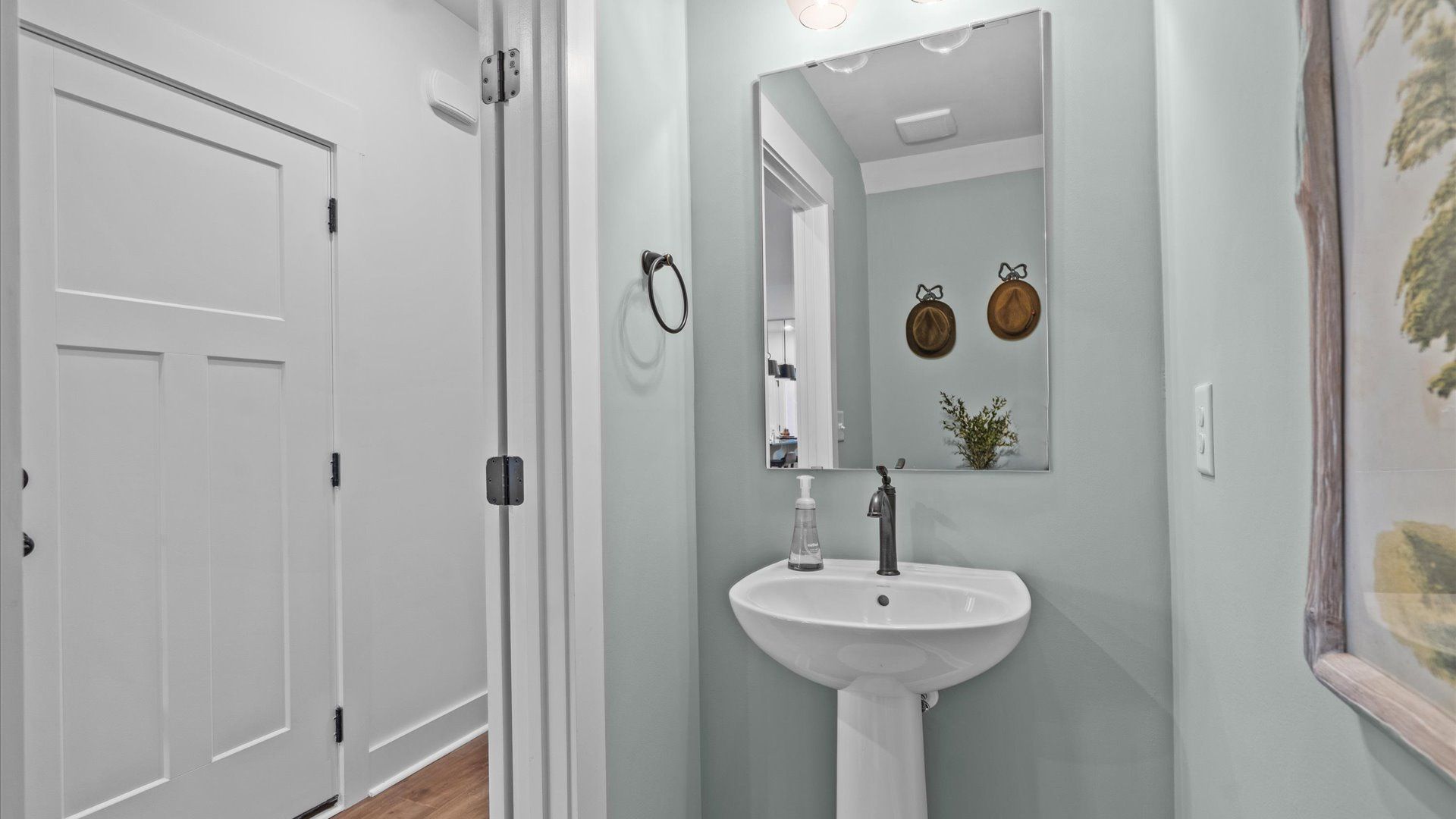 Elegant half bath retreat with designer finishes and a clean, timeless aesthetic suitable for guests in Simpsonville, SC