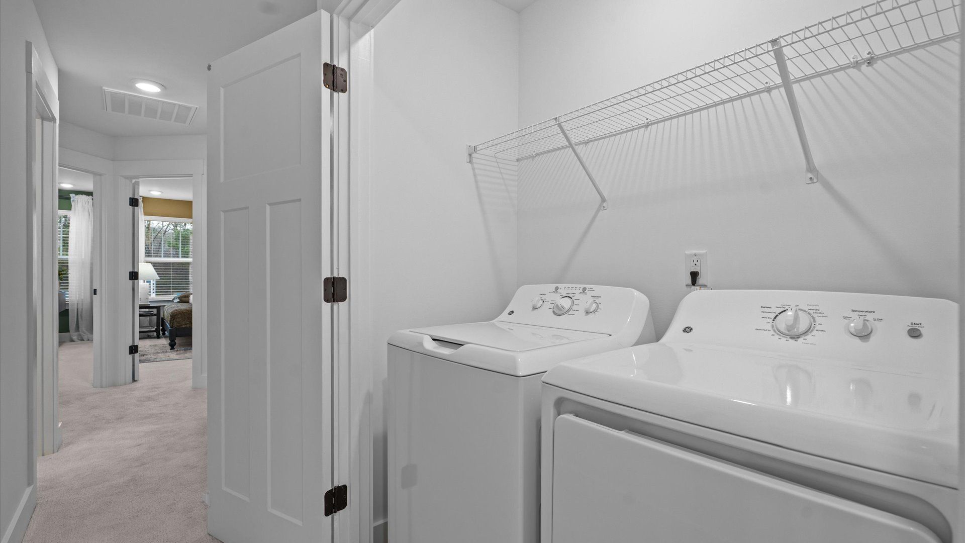 Practical laundry room with washer and dryer at Gresham Station