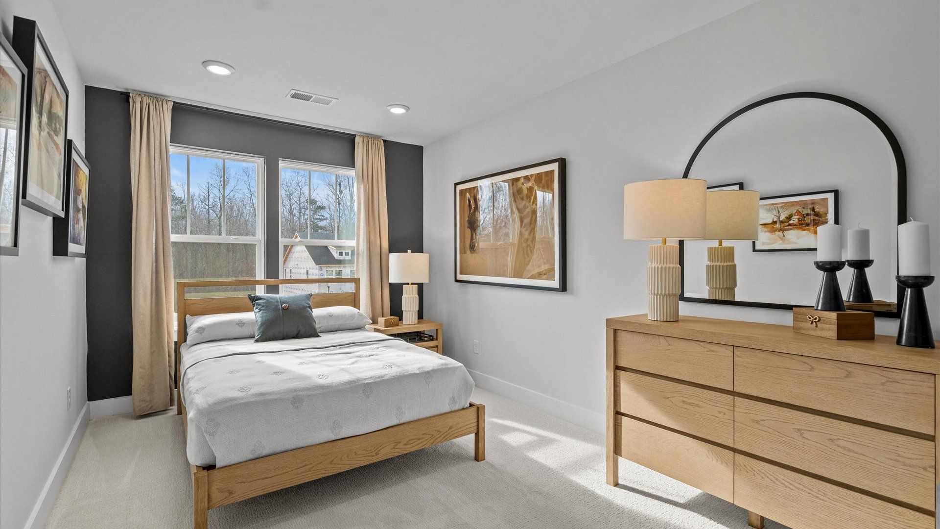 Notable secondary bedroom offering cozy carpeted flooring and a stylish walk-in closet in townhome at El Dorado