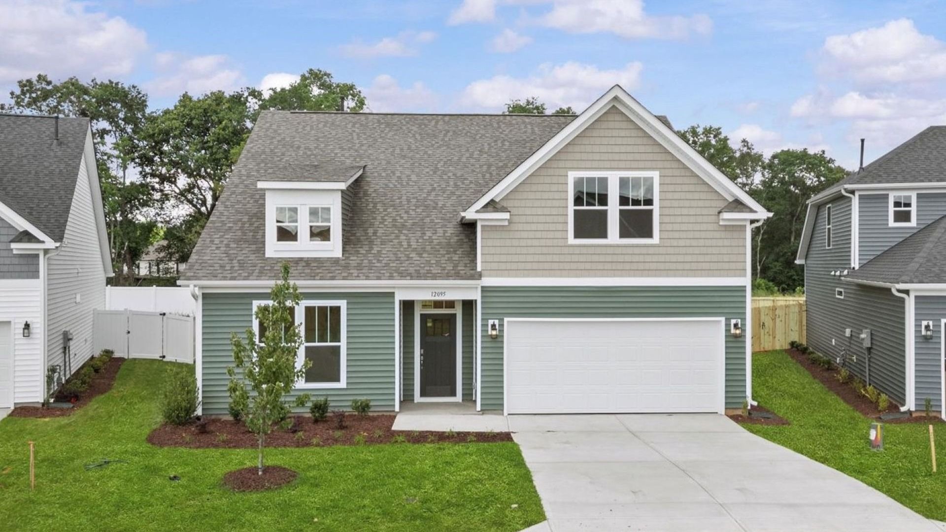 DRB Homes' Walnut Ridge community featuring the Cooper 3 in a stunning bright white exterior with stone detailed columns