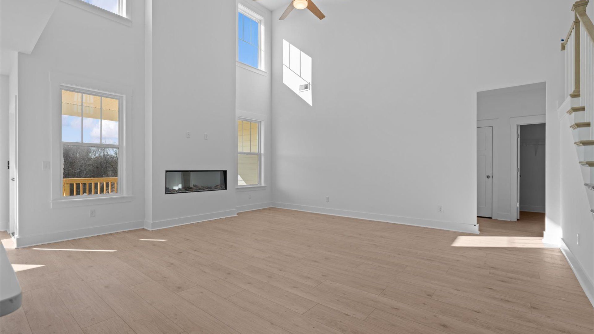 Exclusive living space with towering ceilings, tasteful finishes, and a warm, welcoming feel