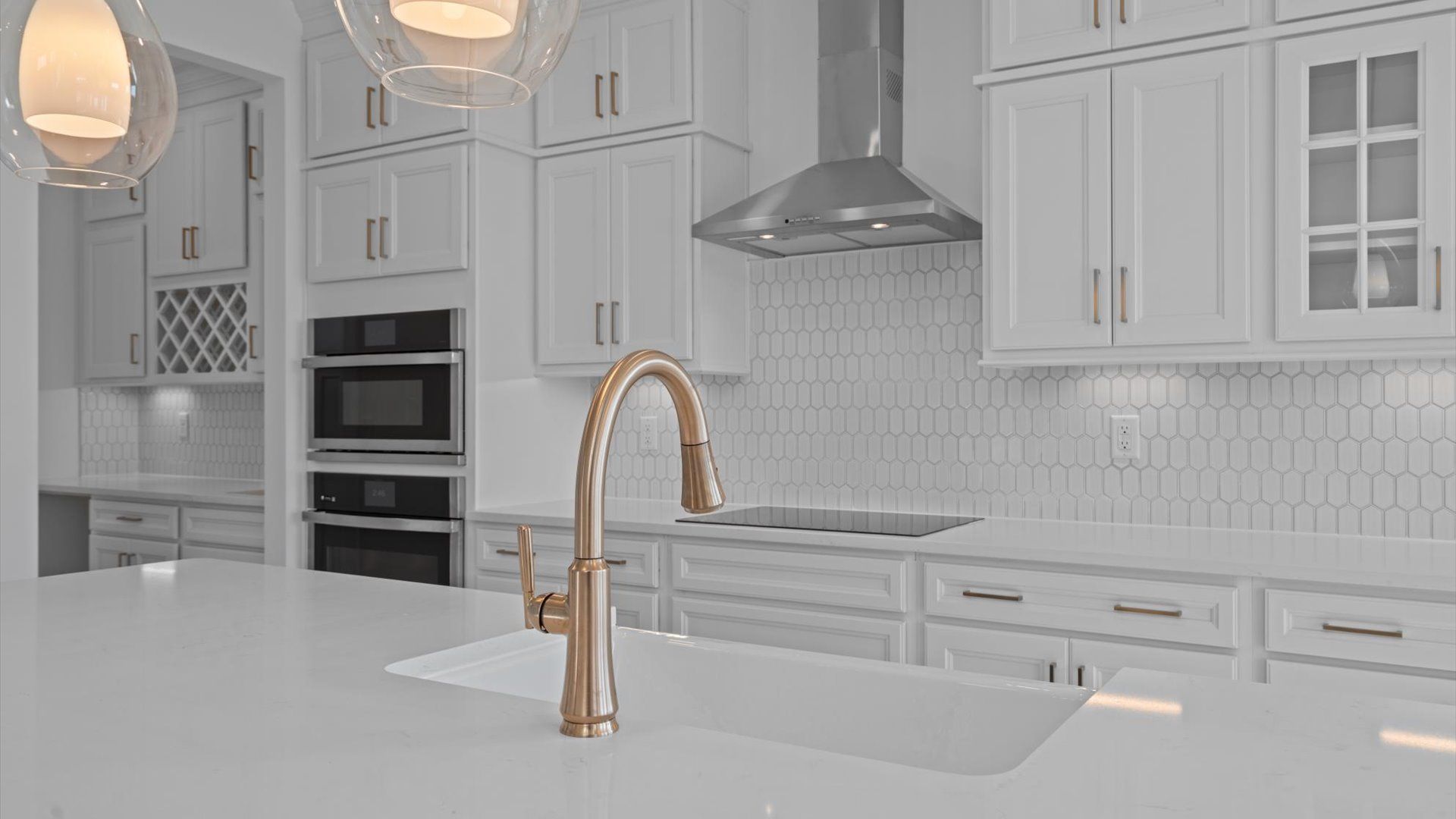 Vibrant kitchen layout with a center island, refined finishes, and open-concept flow