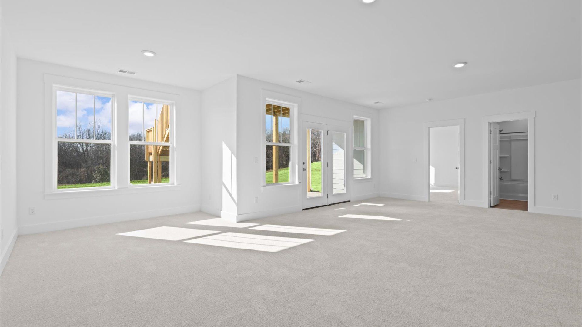 This eye-catching basement space combines a wet bar with guest accommodations for a memorable experience.