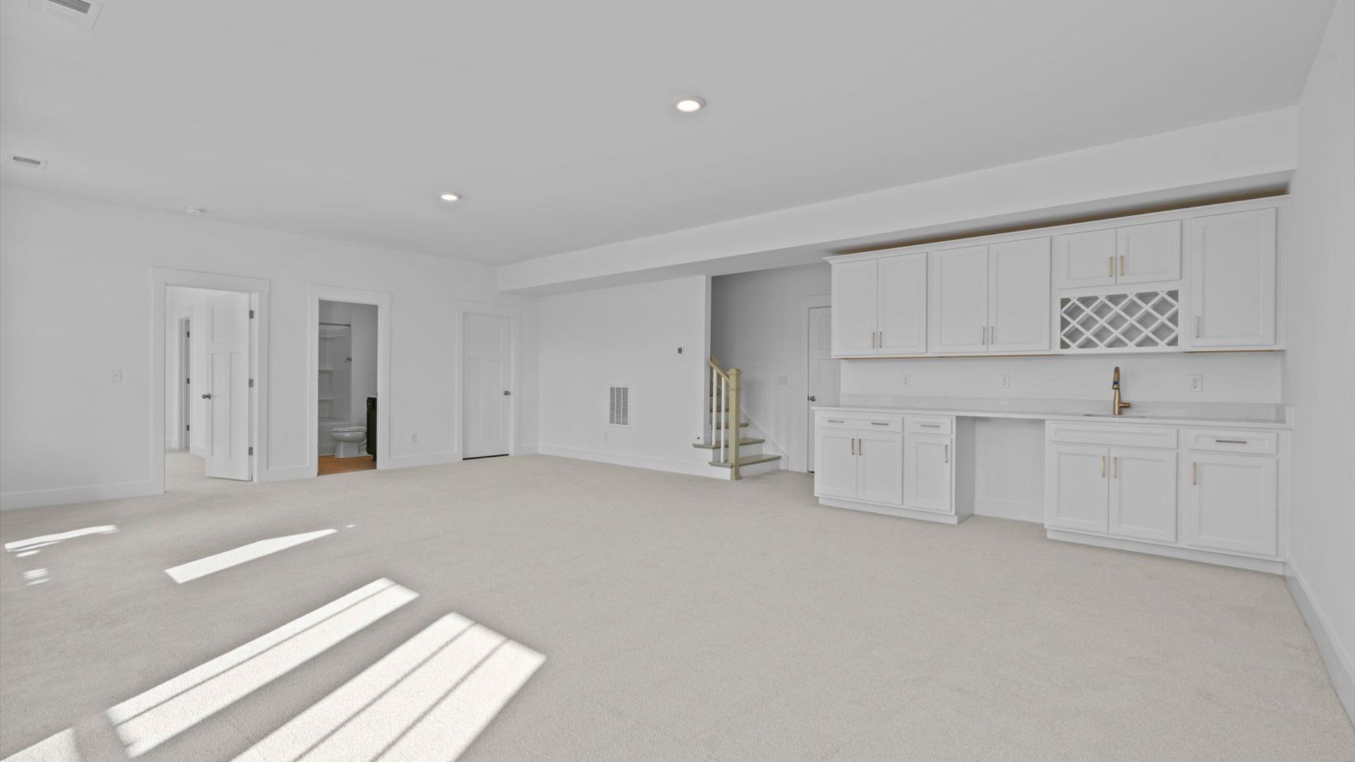 A desirable finished basement offering a bedroom, full bath, and elegant wet bar for effortless entertaining.