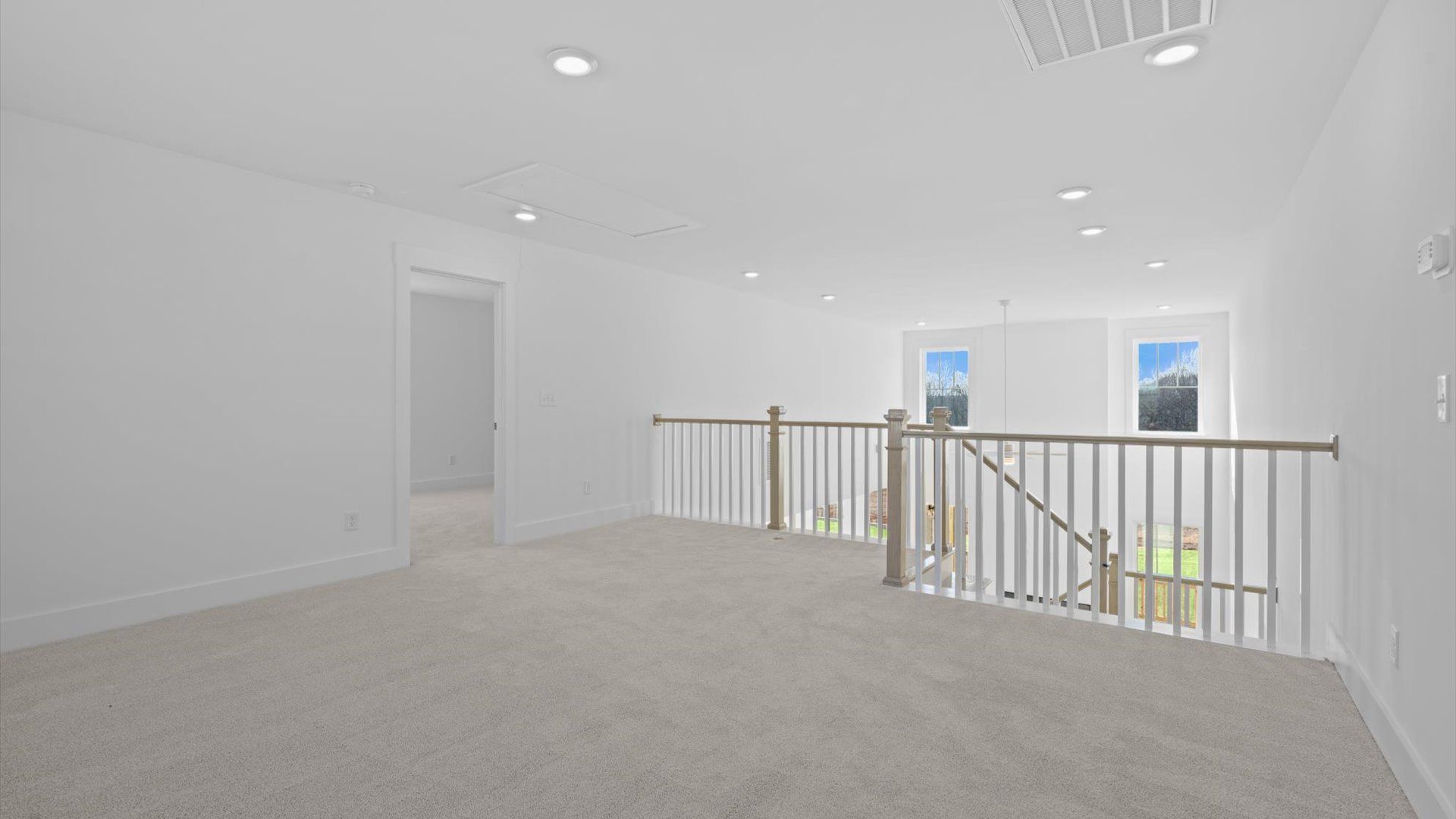 Notable carpeted loft designed with high standards and refined finishes