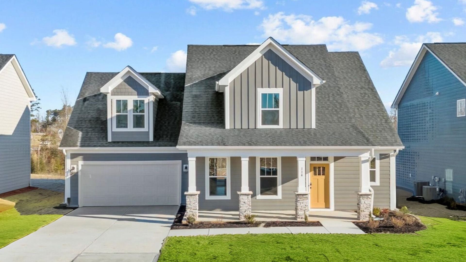 Refined exterior design with balanced architectural detail in this distinguished two-story home at Kayfield at Midway