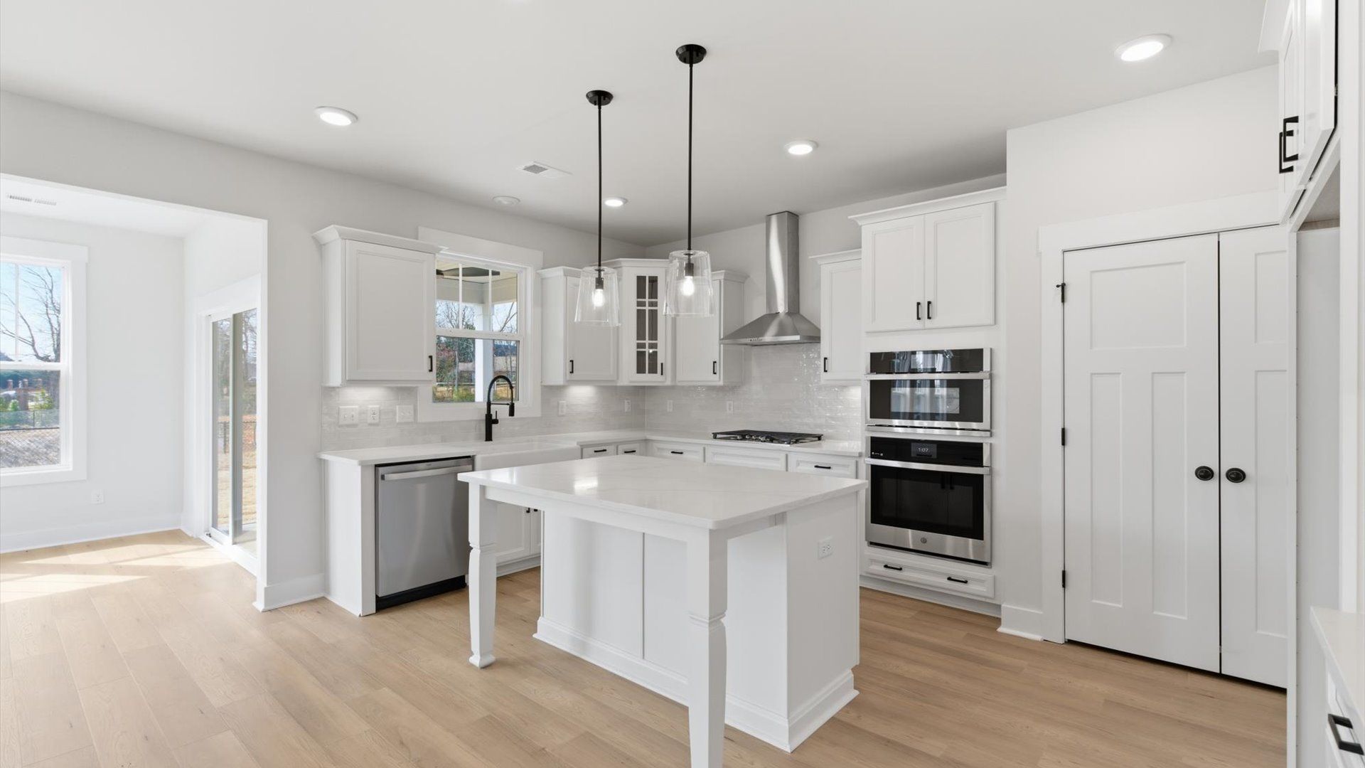 Memorable meals begin in this vibrant kitchen with pendant lighting and a thoughtfully designed island in Greenville, SC