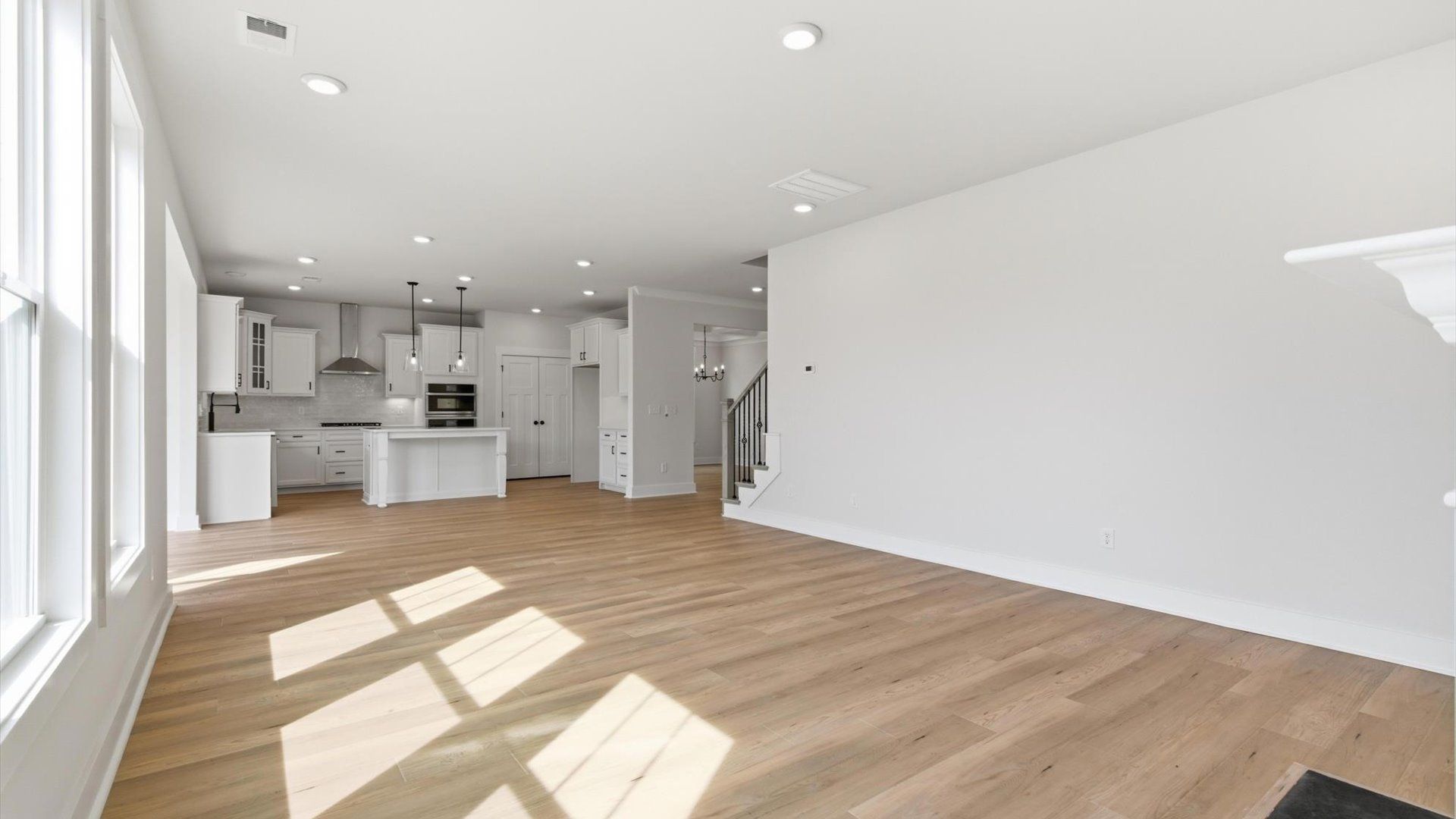 First-rate living space with tasteful hardwood floors and a functional open-concept design at Pelham Crossing