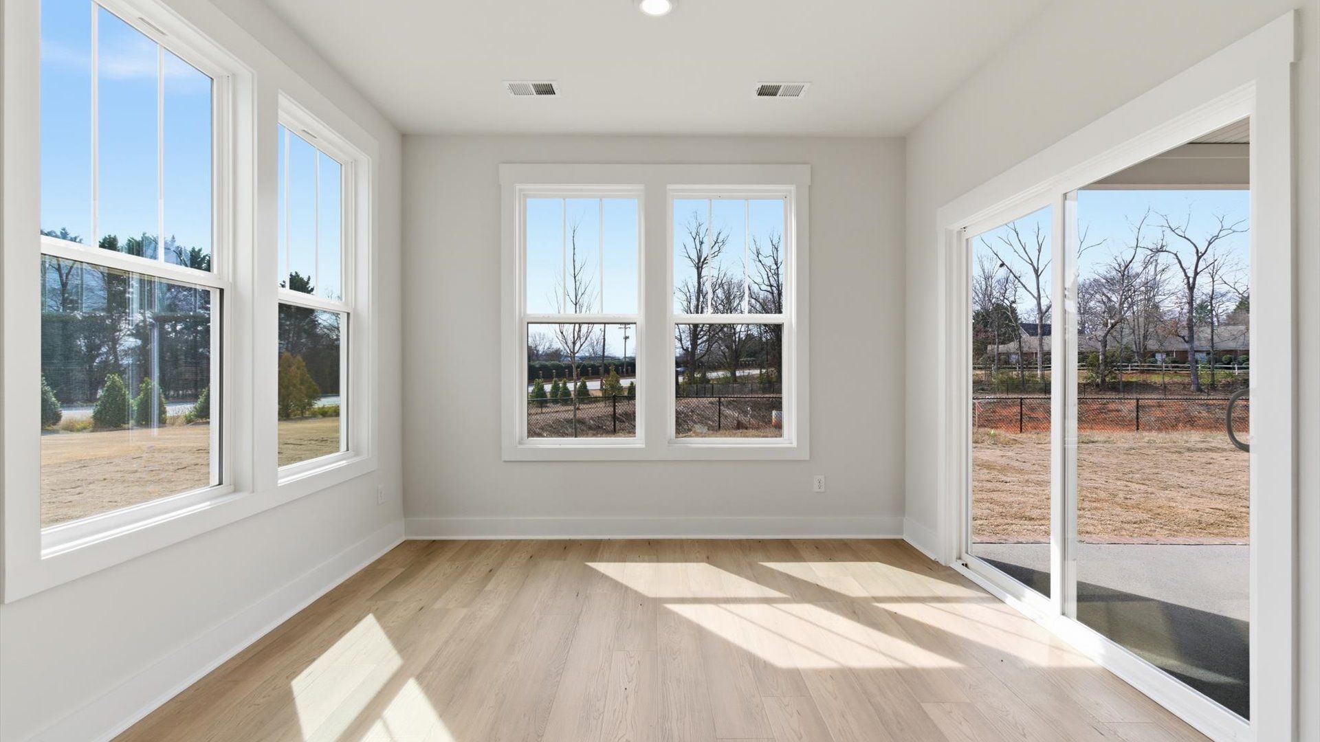 Notable breakfast area with high standards and elegant millwork in this accomplished home located in Greenville, SC