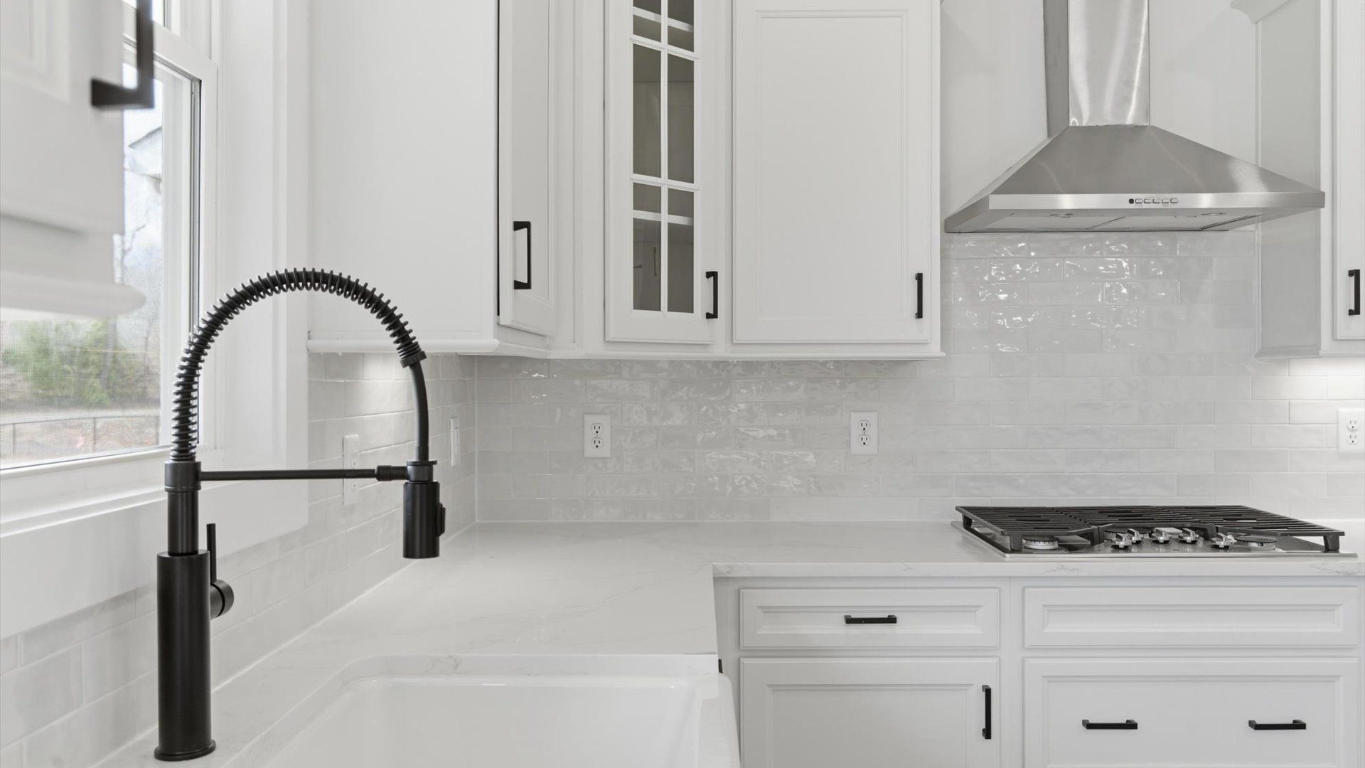 Beautifully appointed kitchen with spacious counters and sophisticated detailing located at Pelham Crossing