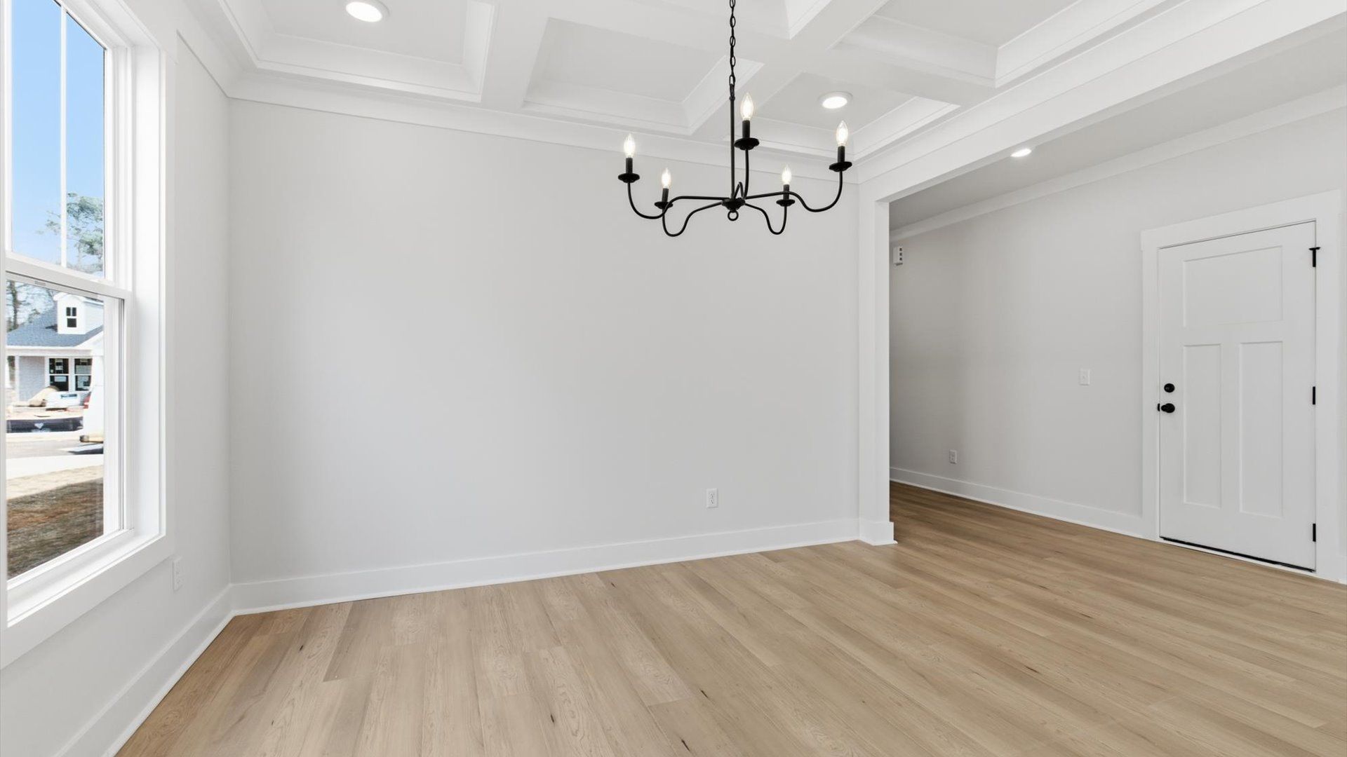 Thoughtful design meets architectural elegance in this coffered ceiling dining room in Greenville, SC