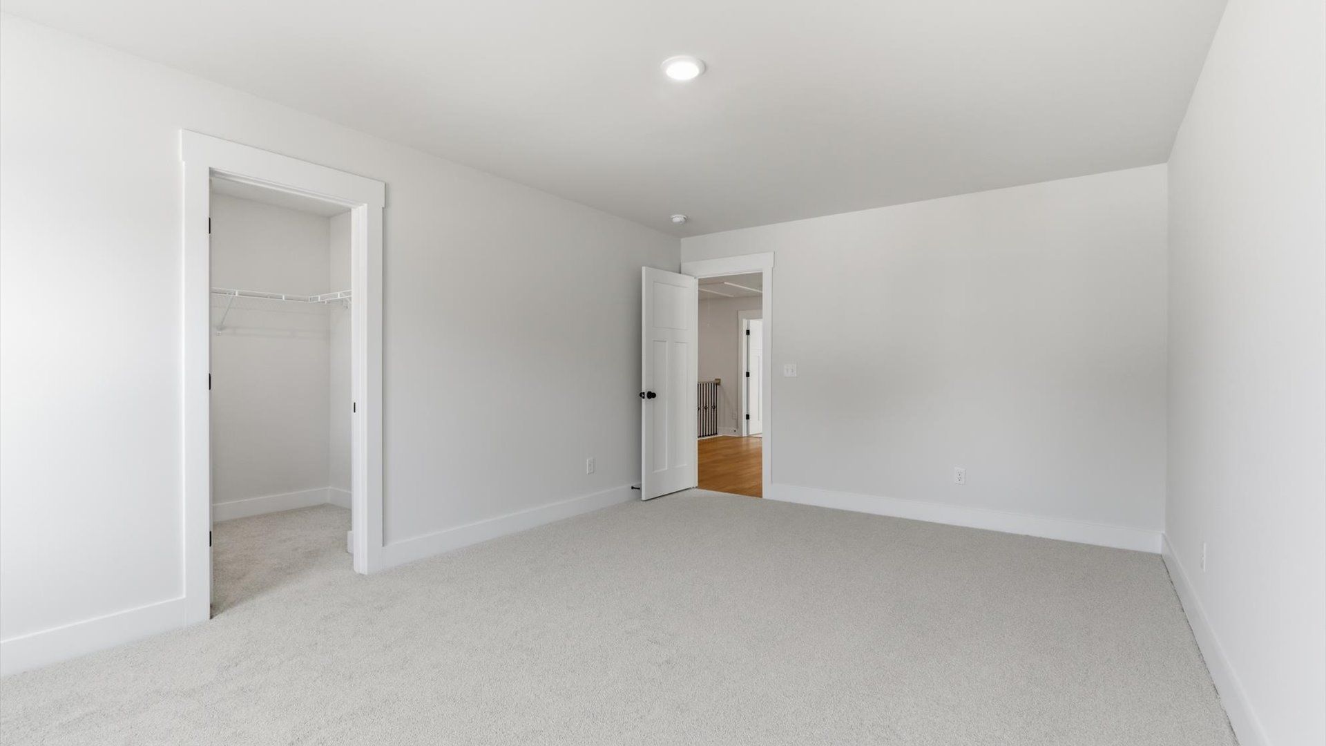First-class bedroom with generous proportions, a walk-in closet, and beautiful natural light through large windows in SC