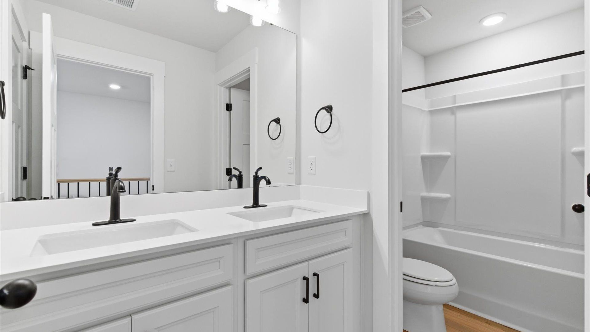 Accomplished full bath designed with both comfort and sophistication in mind at the Pelham Crossing community