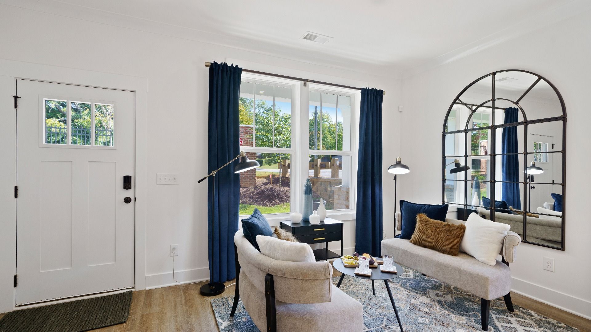 Vibrant and welcoming family room anchored by clean lines, tasteful materials, and abundant light near Downtown Greenville