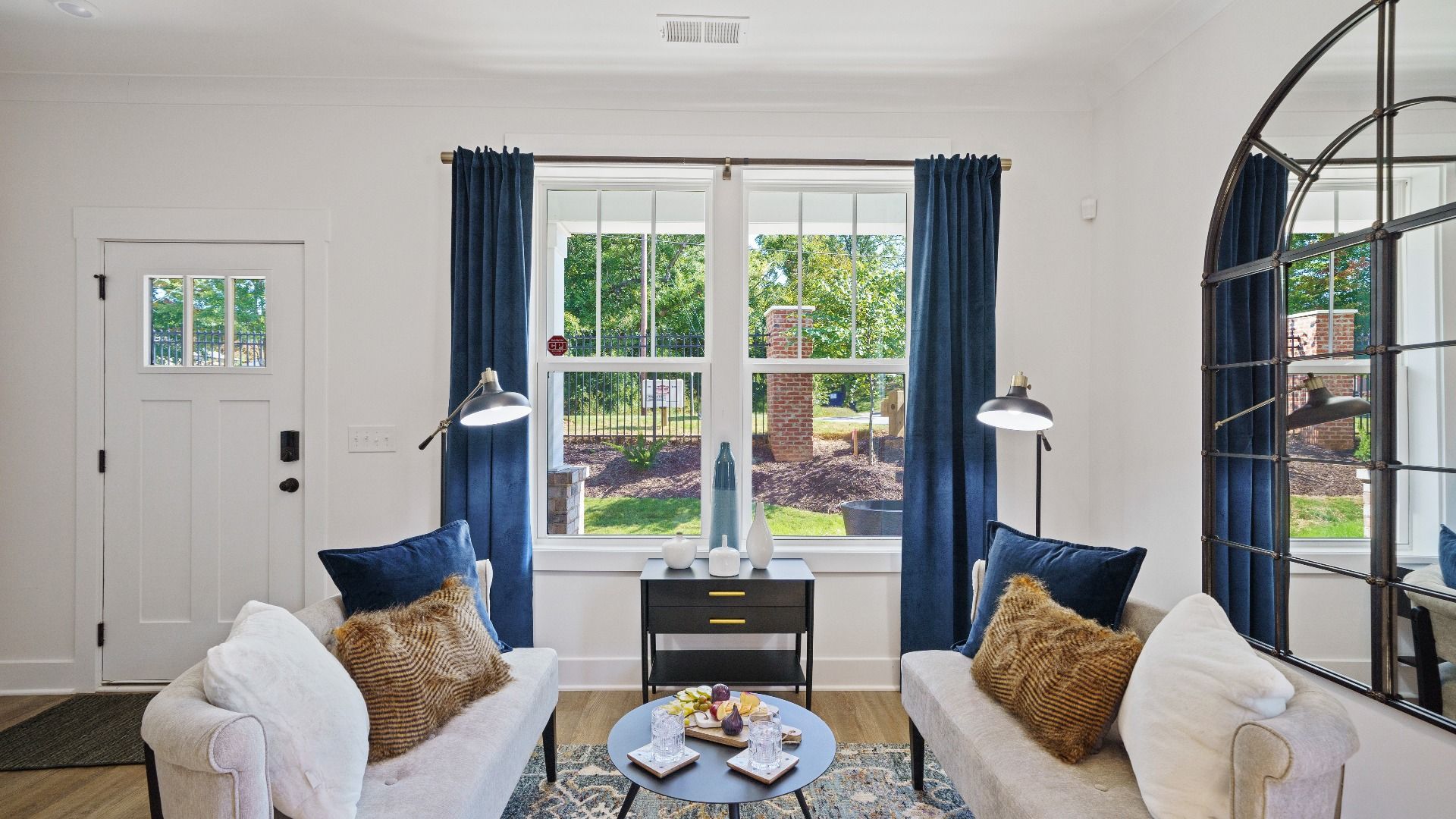 Highly functional family room with established charm and current styling in a reputable new community in Greenville, SC