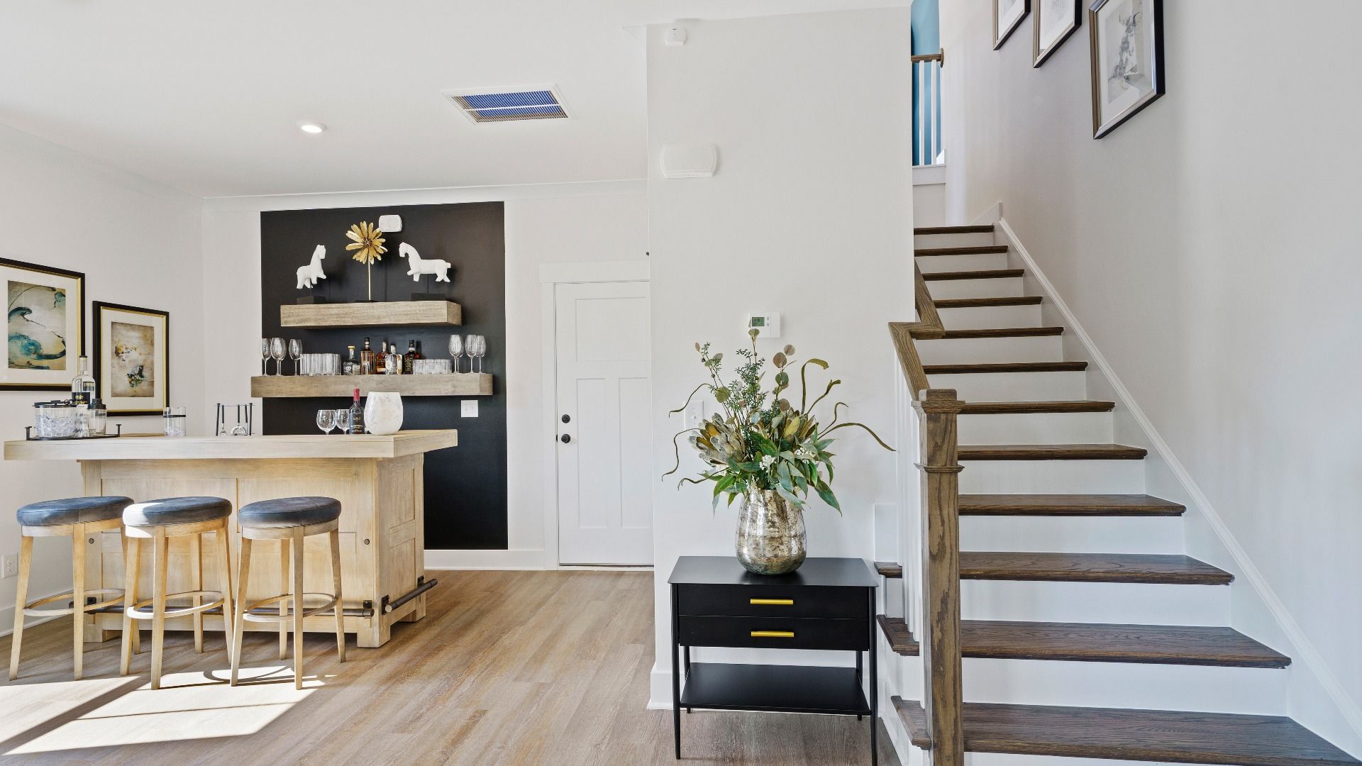 Exceptional living space with hardwood floors and seamless flow to dining and kitchen areas