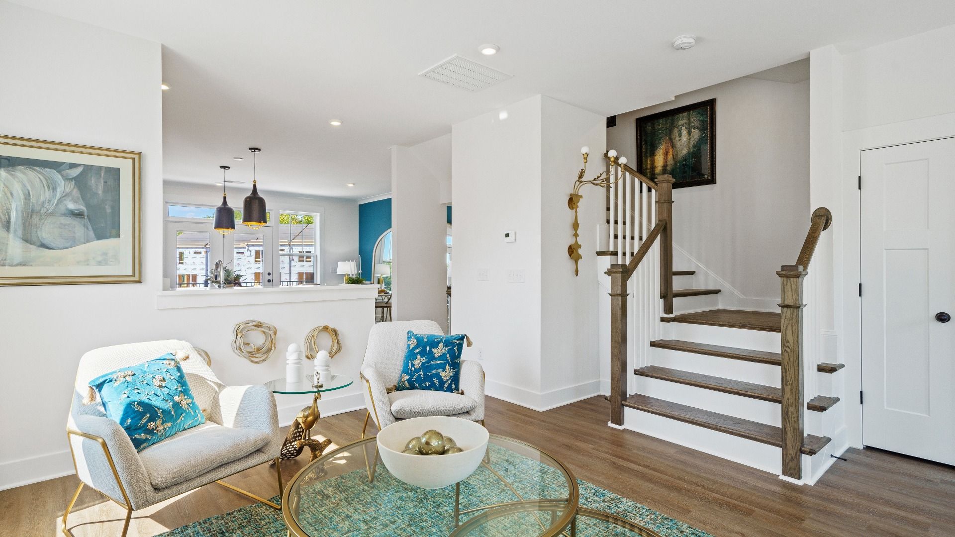 Exceptional family room with hardwood flooring in this exclusive Greenville-area villa
