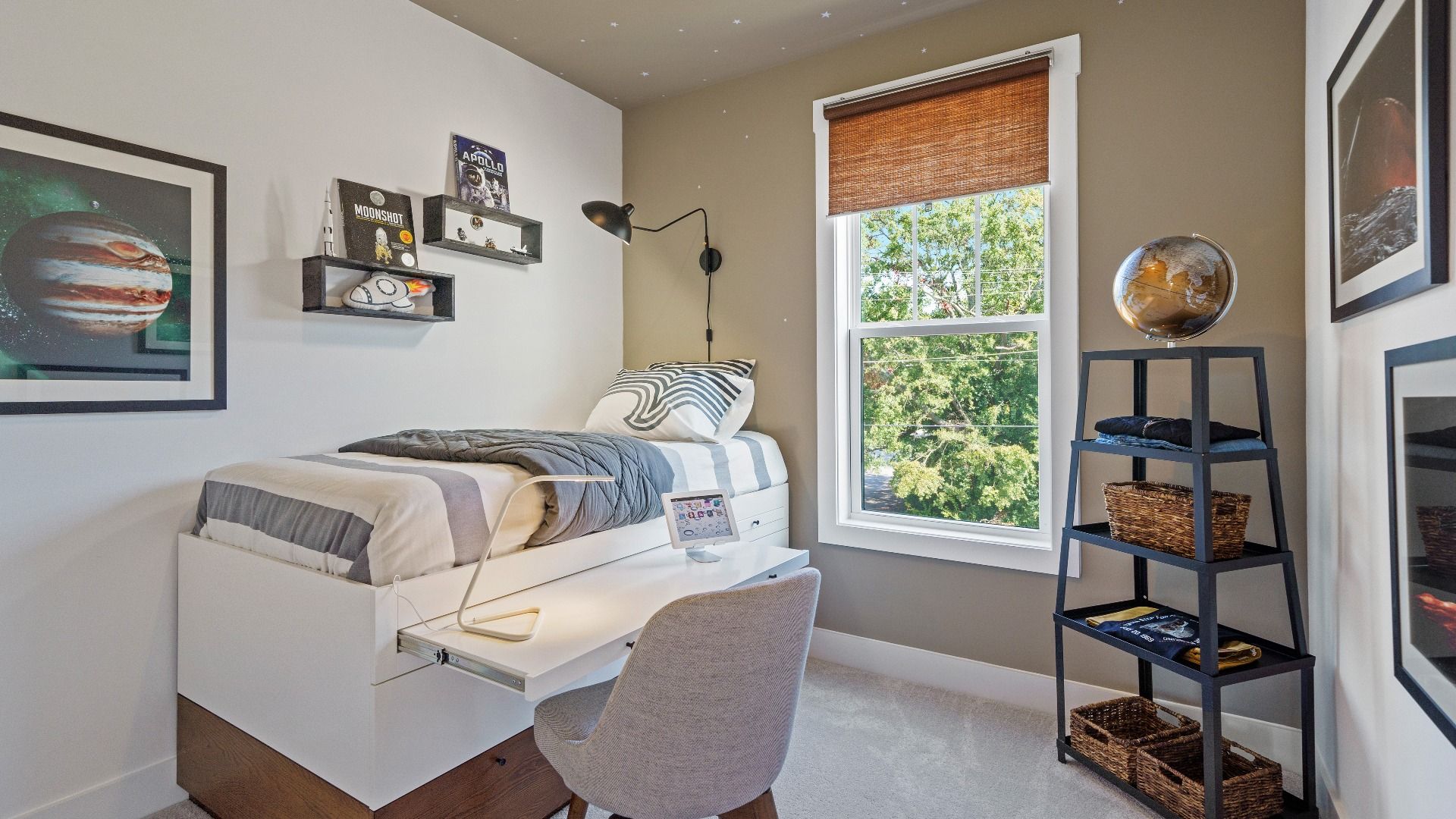 Highly functional bedroom with a large window, carpeted flooring, and tasteful finishes throughout at Montgomery Chase