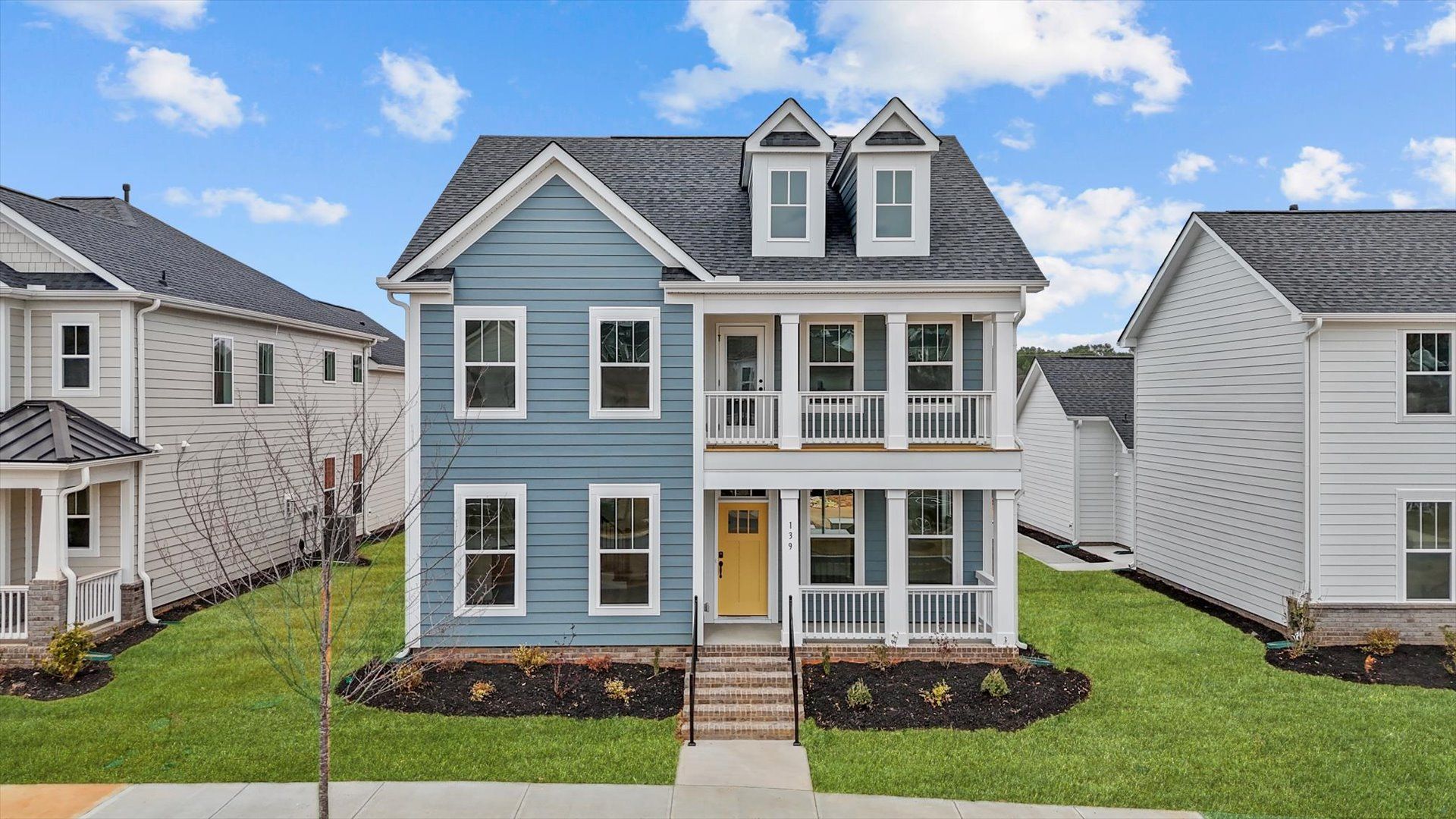 Vibrant home exterior of the Grayson design in a thoughtfully planned community near city conveniences