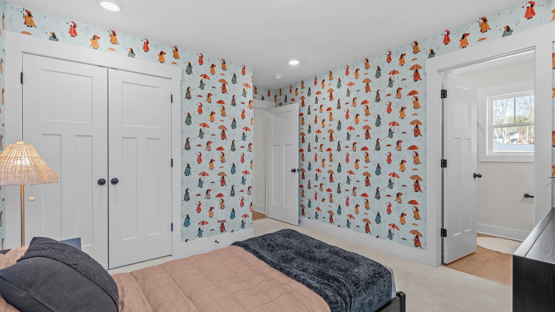 Superior comfort in a secondary bedroom with plush carpet and an oversized walk-in closet and bathroom