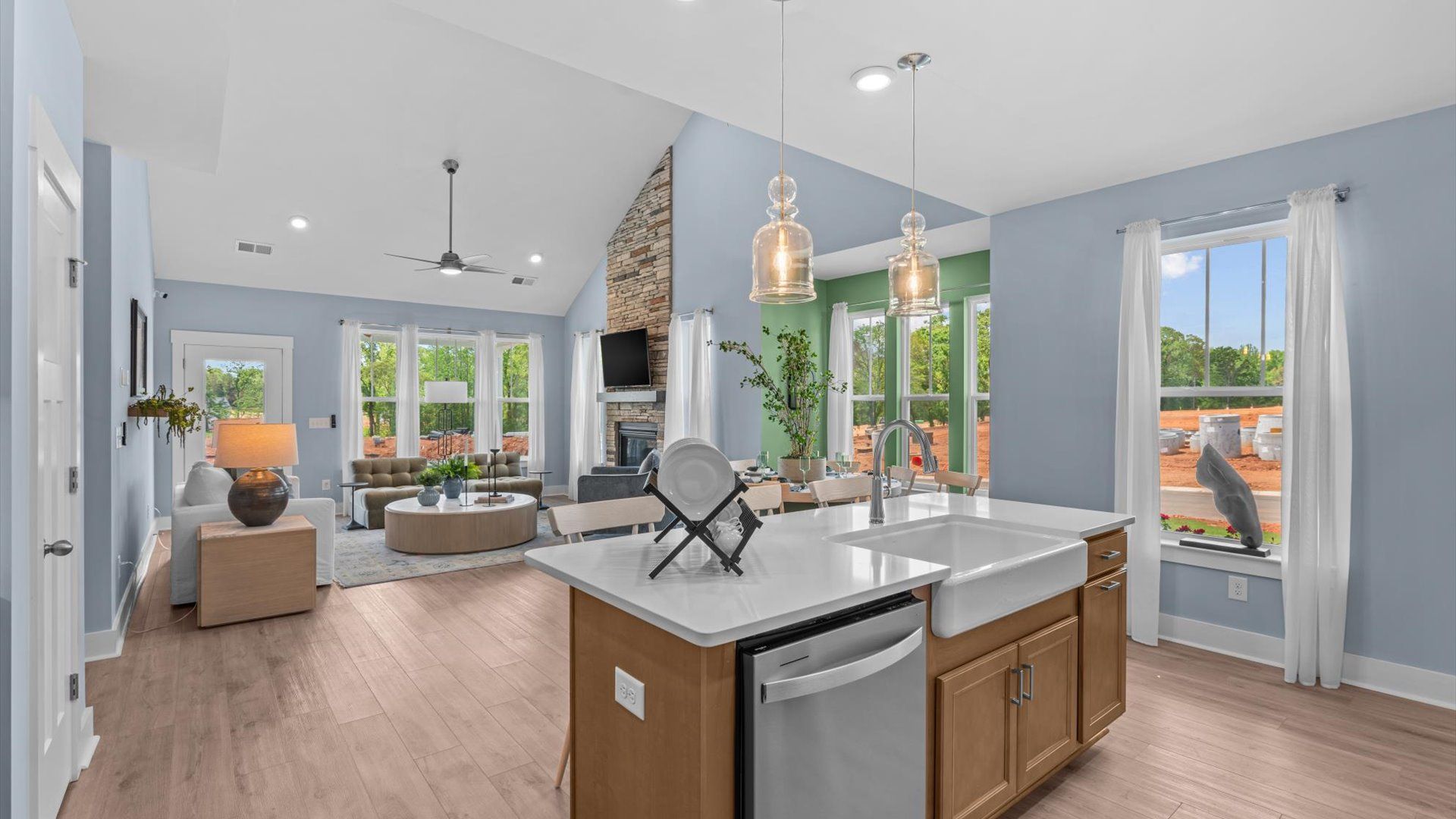 Notable kitchen space with elegant pendant lighting and a center island perfect for entertaining in Greenville, SC