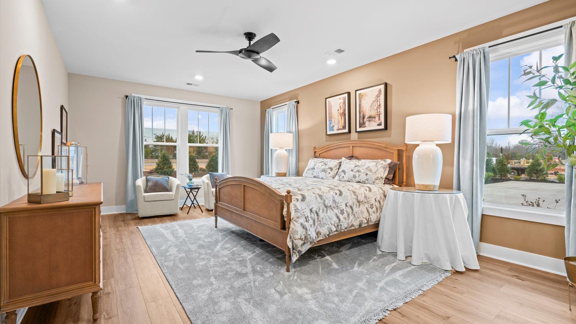 Eye-catching details and elegant finishes in the vibrant primary suite of this select home in Greenville, SC