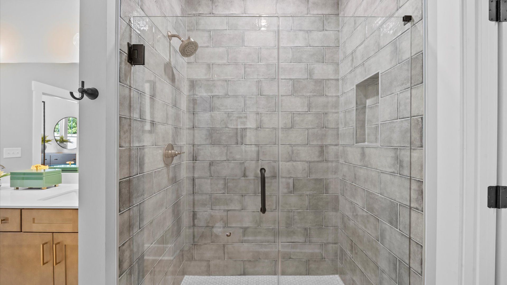 Notable primary bath featuring a walk-in shower and tasteful design touches throughout located at Robert's Farm