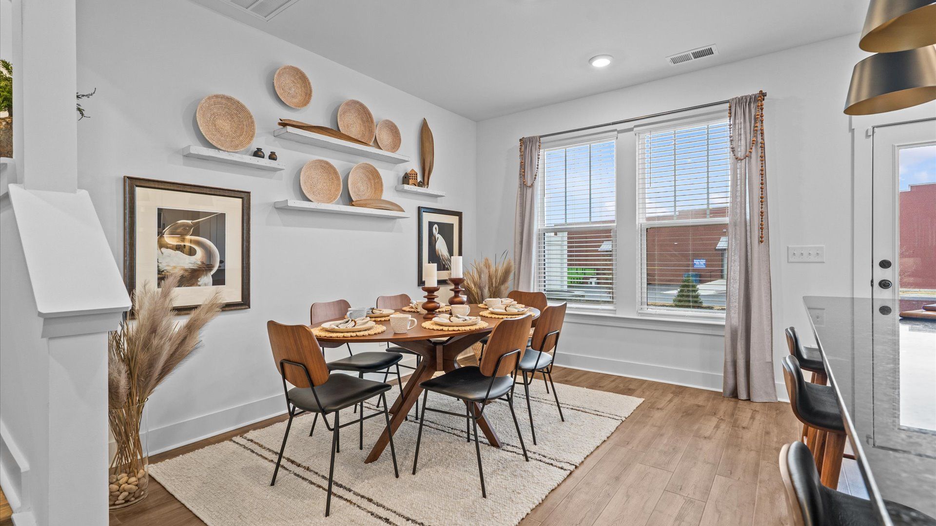Memorable meals start in this exclusive dining space featuring elegant trim and natural light at Anna's Pointe