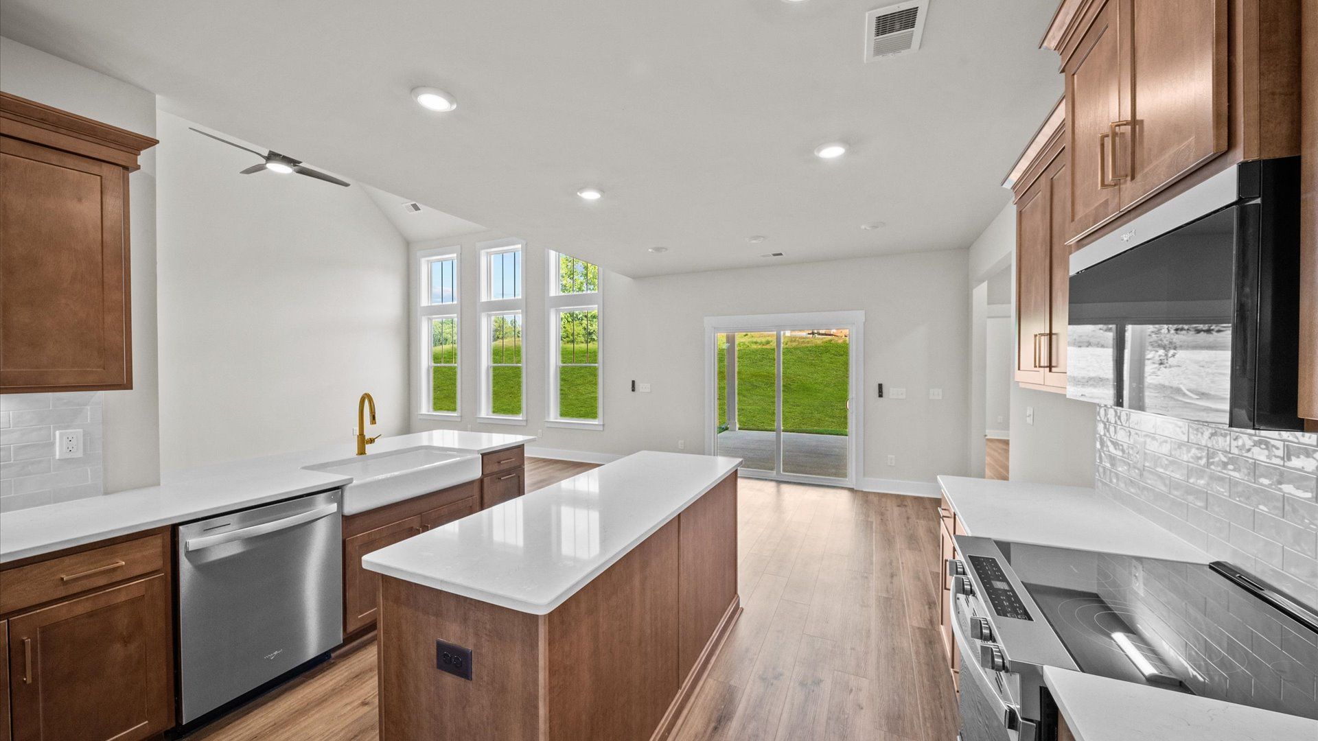 Contemporary kitchen in the Sutherland Design with sleek finishes and a practical, open layout located near Clemson, SC