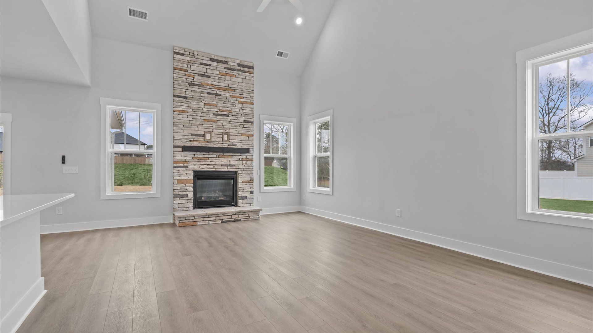 Light-filled family room in the Sutherland Design with modern appeal and functional design elements in Seneca, SC