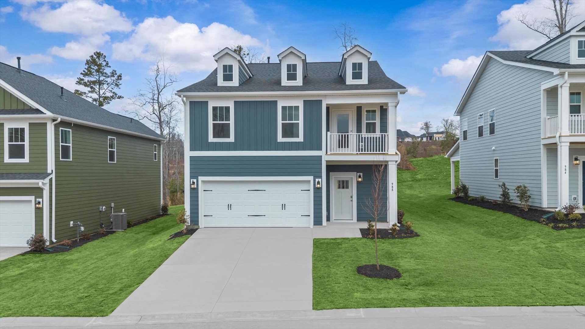 Exclusive DRB Homes exterior with balanced proportions and vibrant curb appeal at the new Easler Farm community