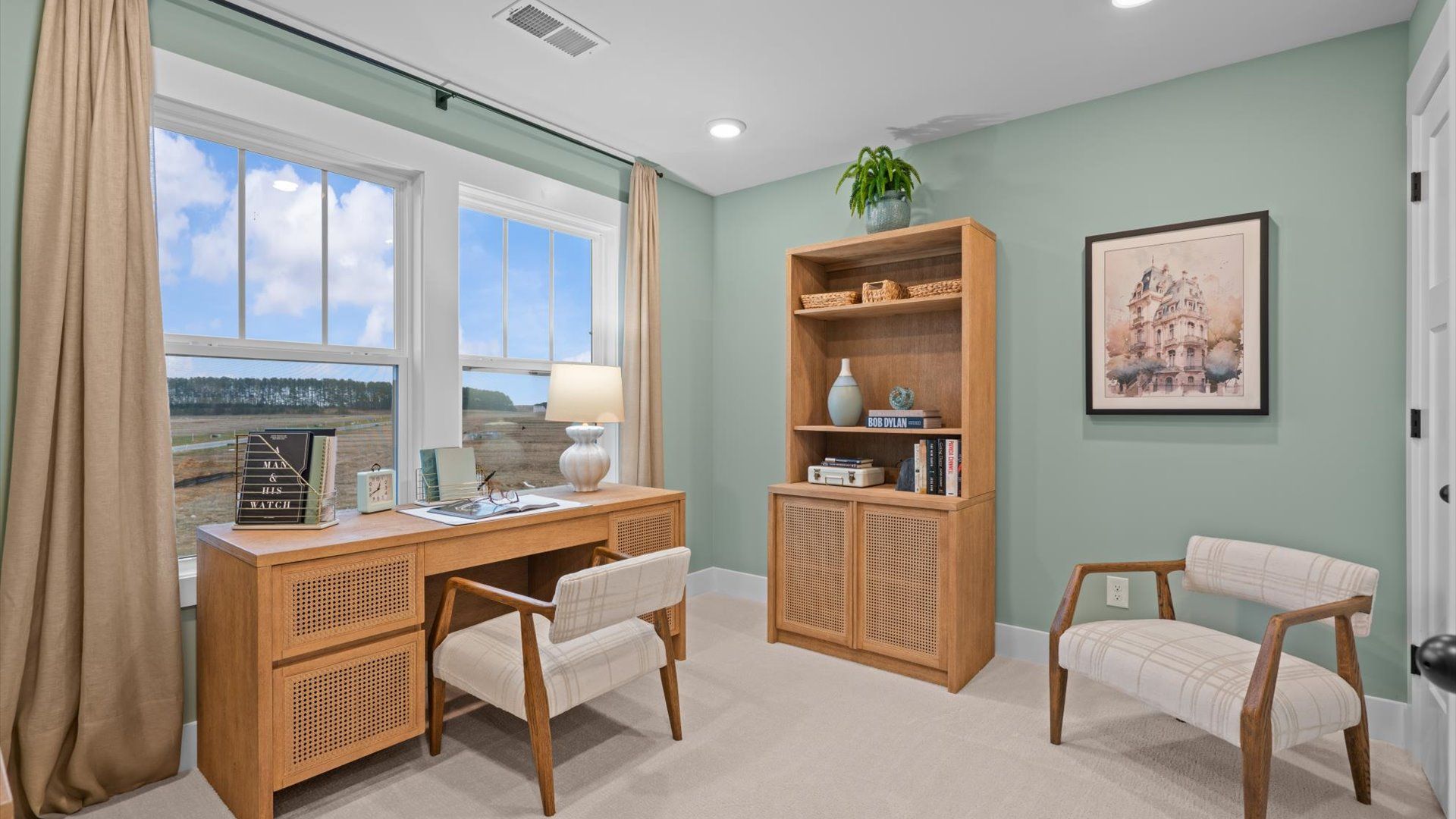 Exceptional home office with large windows and refined finishes throughout at the new Easler Farm community