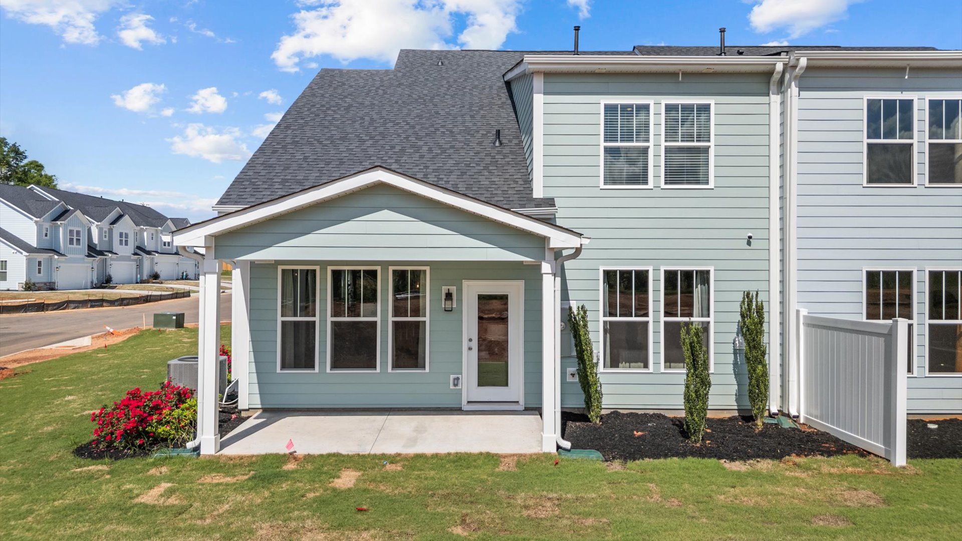 Exclusive rear covered porch with accomplished detail and elevated outdoor living potential at Barton Hollow