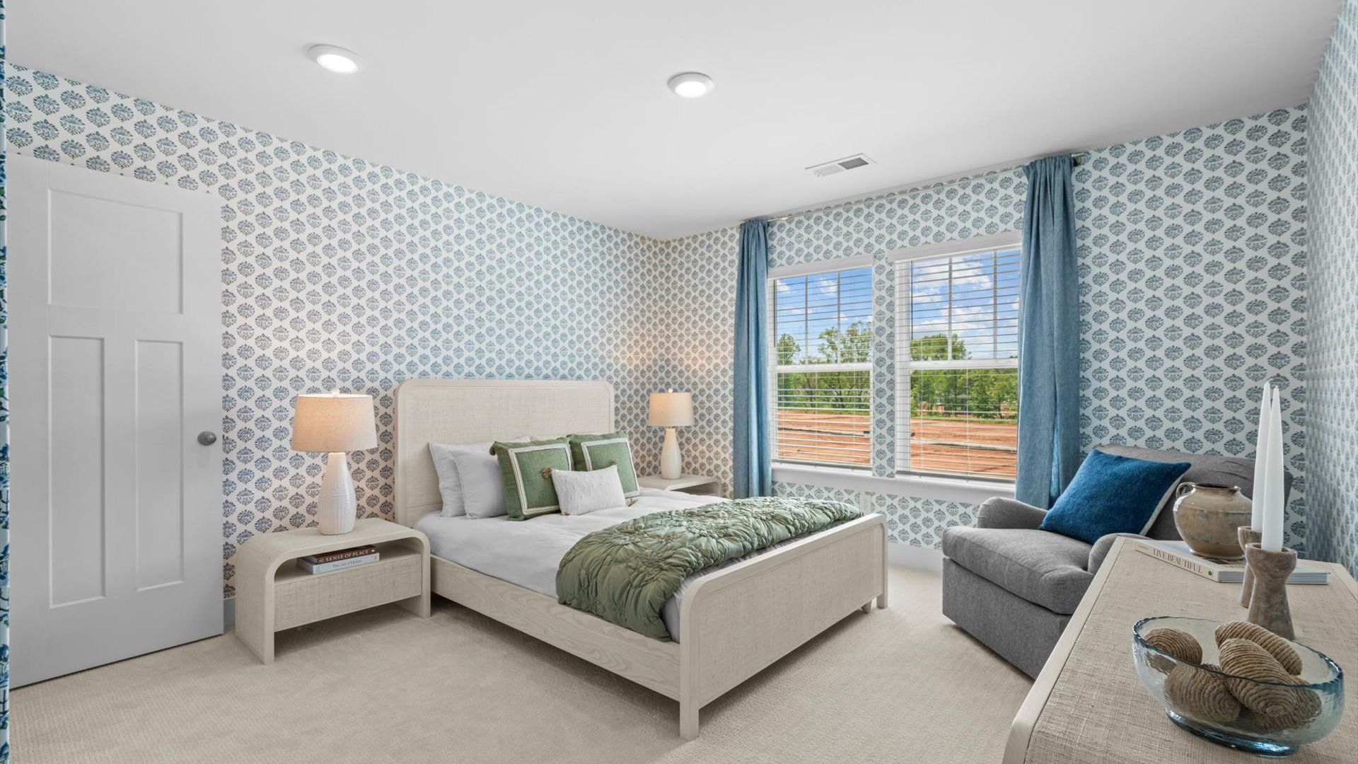 Elegant bedroom retreat featuring soft carpet and oversized windows that create a bright, welcoming space at Barton Hollow