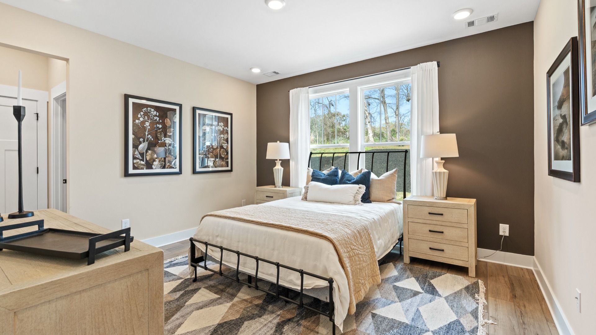 Eye-catching details and elegant finishes in the vibrant primary suite of this select home near Downtown Fountain Inn