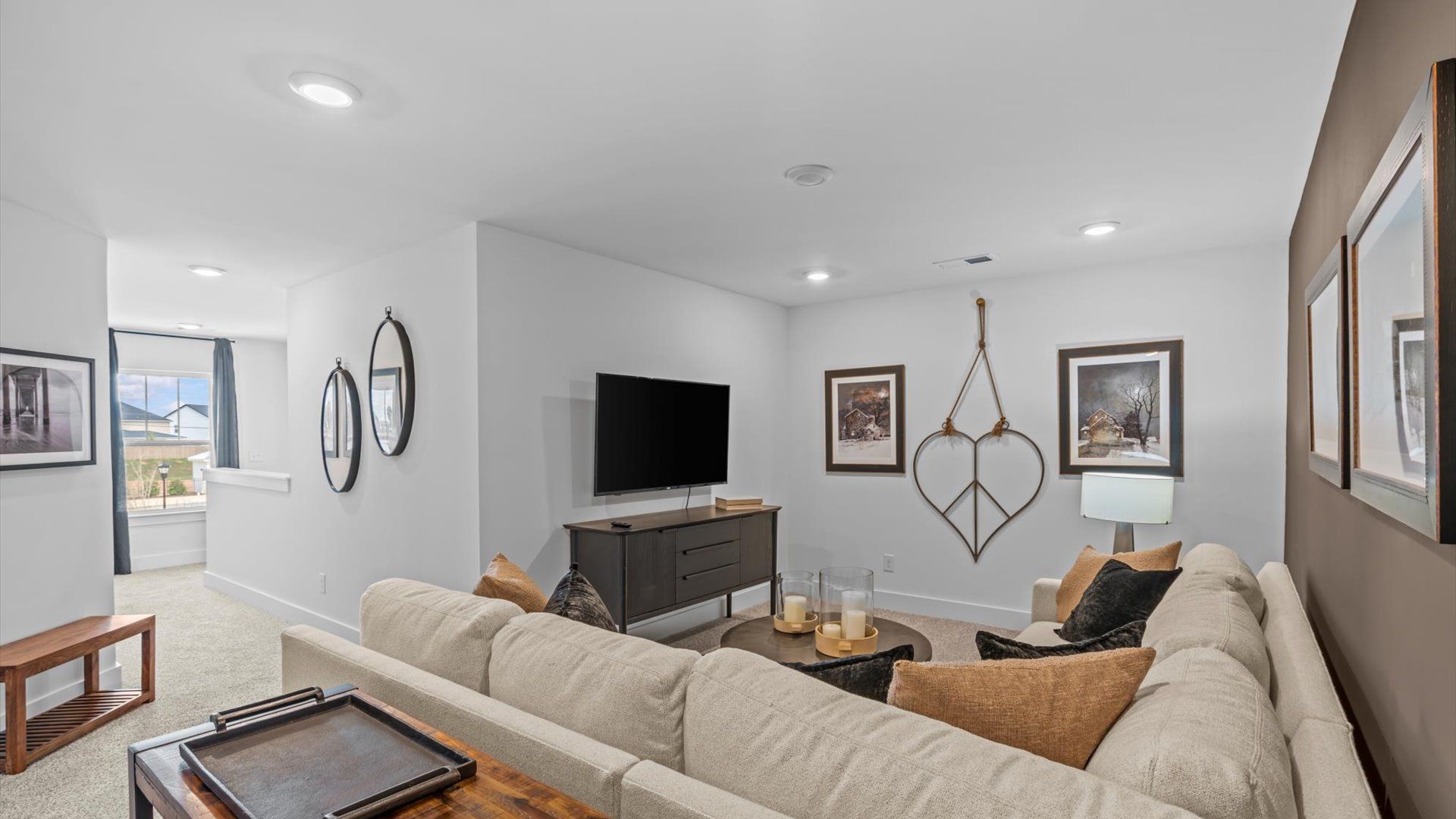 Refined loft with comfortable carpeted flooring and tasteful design throughout at Barton Hollow