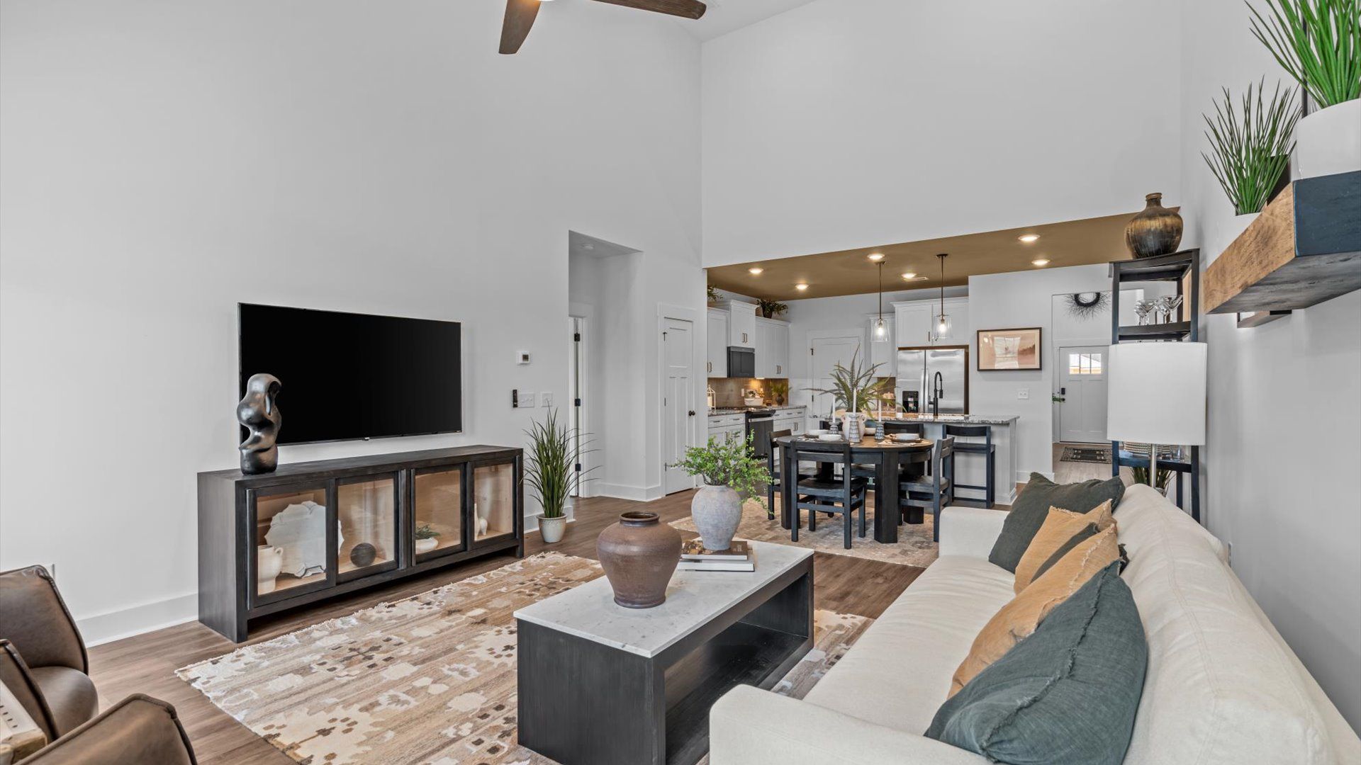 Two-story ceilings and superior scale define this elegant, light-filled family room near Downtown Fountain Inn