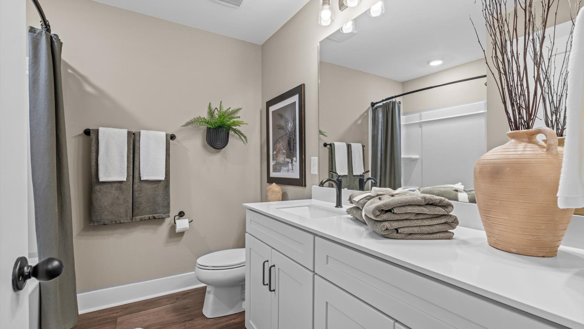 Stylish guest bathroom with superior design and thoughtful storage solutions in Fountain Inn, SC