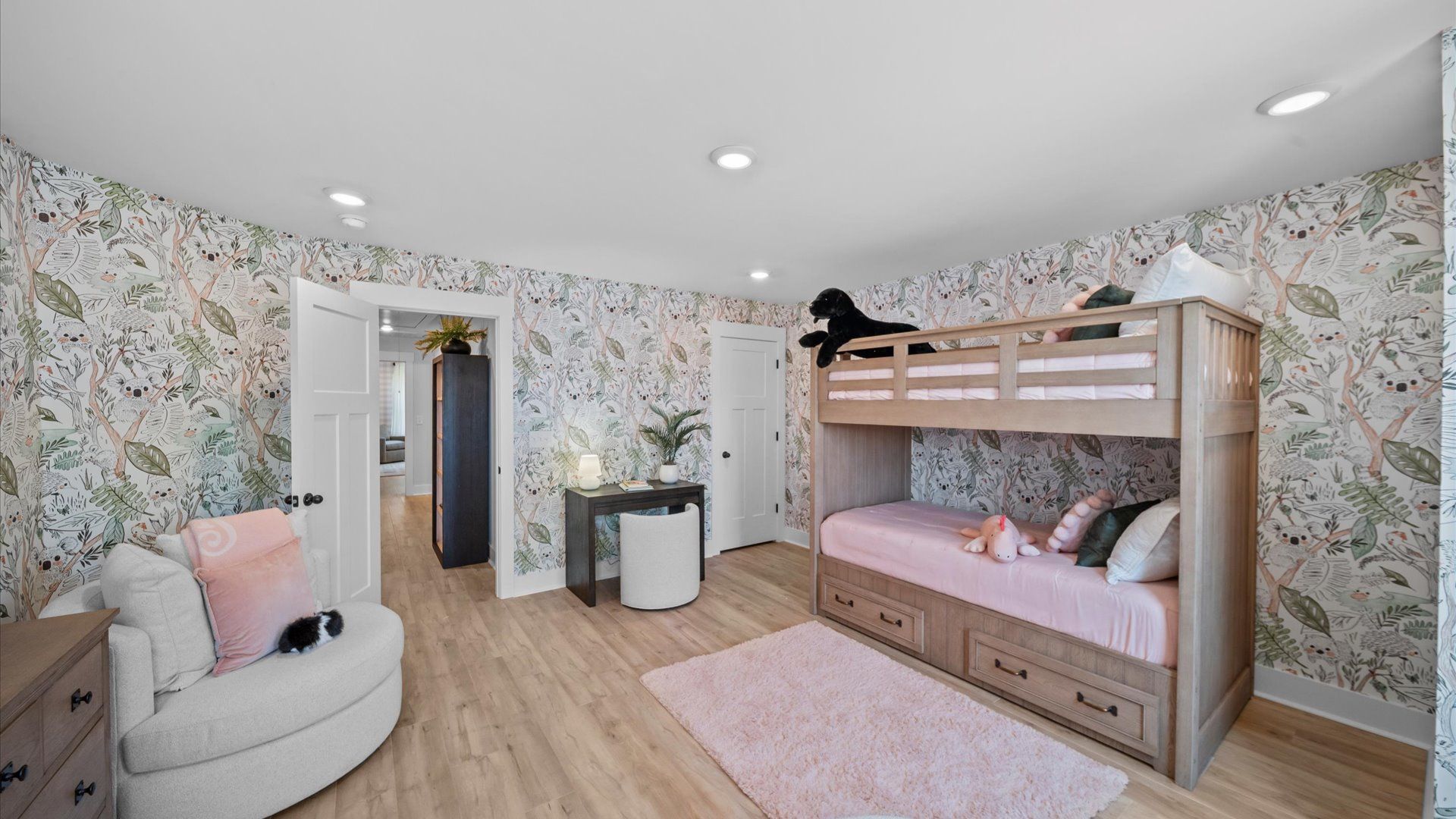 Desirable hardwood flooring in all bedrooms creates a cohesive and elegant interior in Fountain Inn, SC